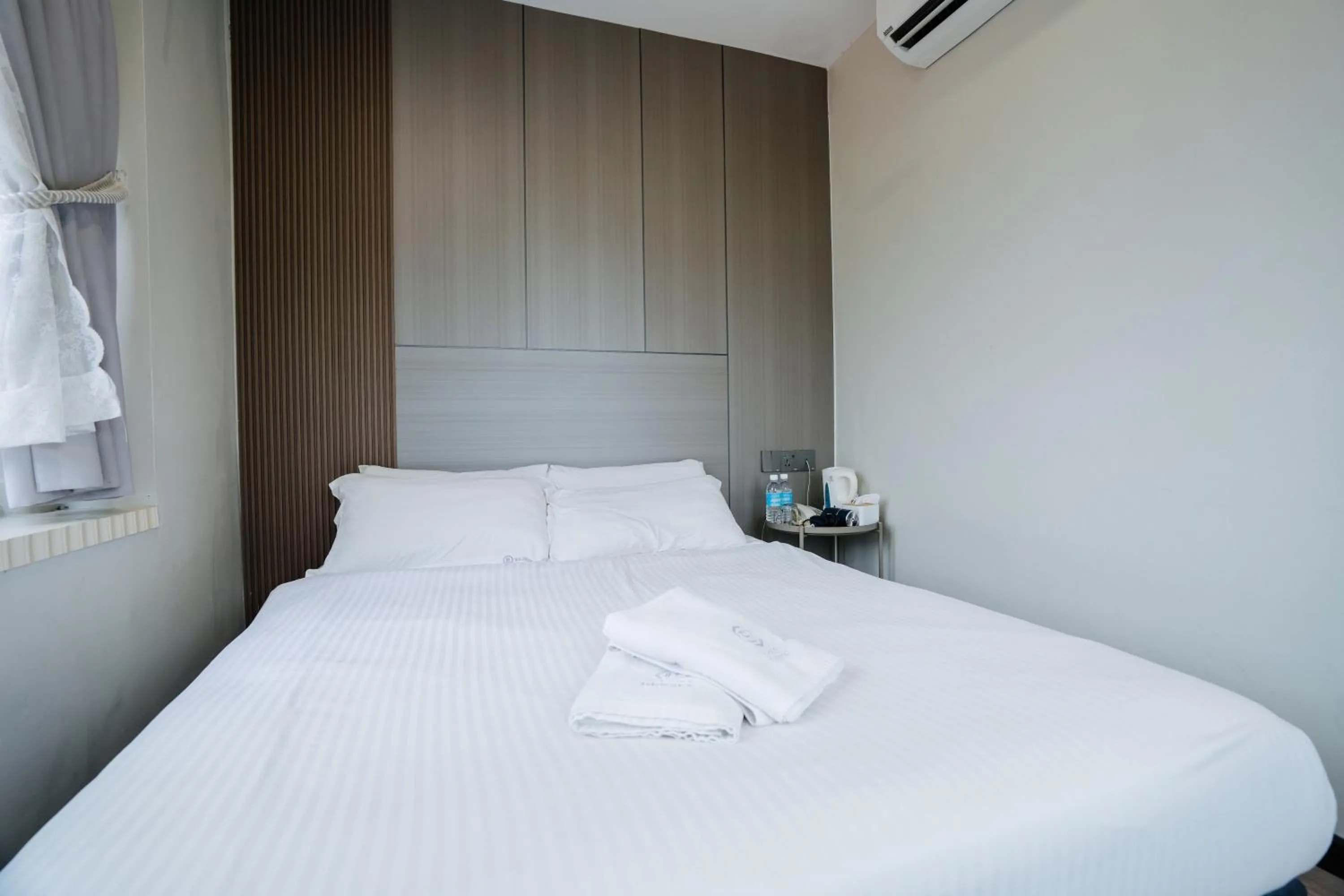 Bed in Wangs Hotel Gurney Drive