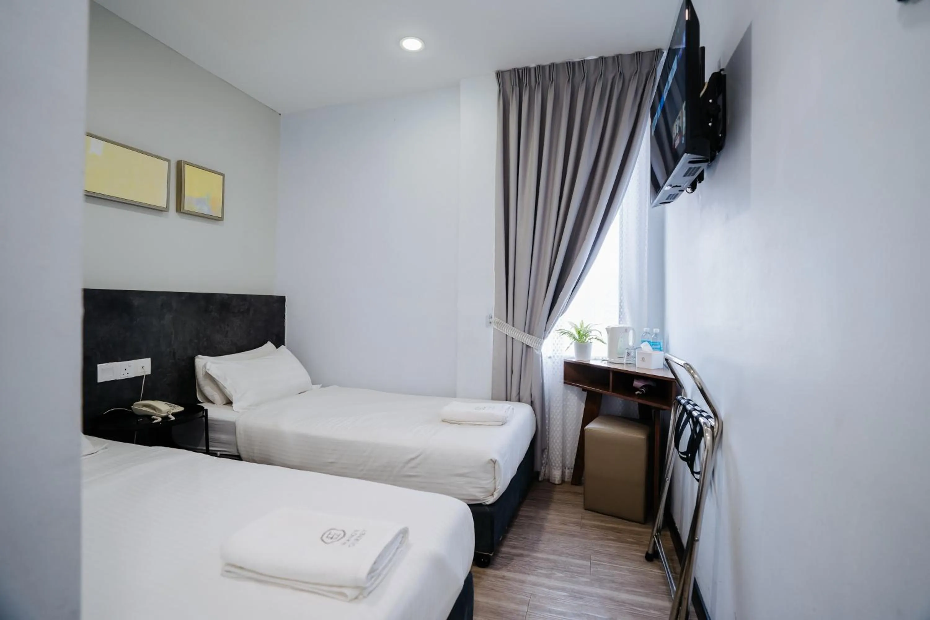 Bed in Wangs Hotel Gurney Drive