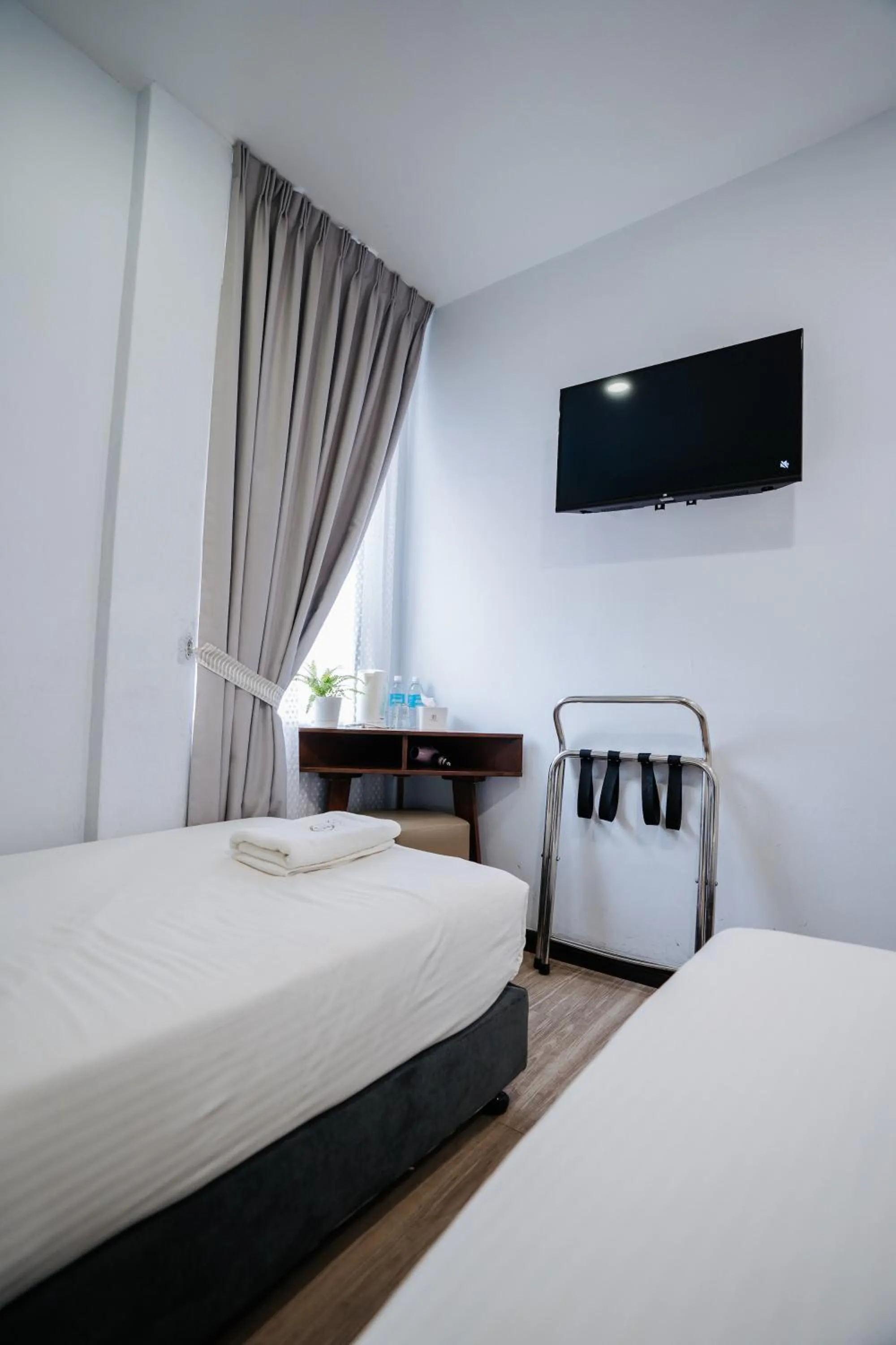 Bed in Wangs Hotel Gurney Drive