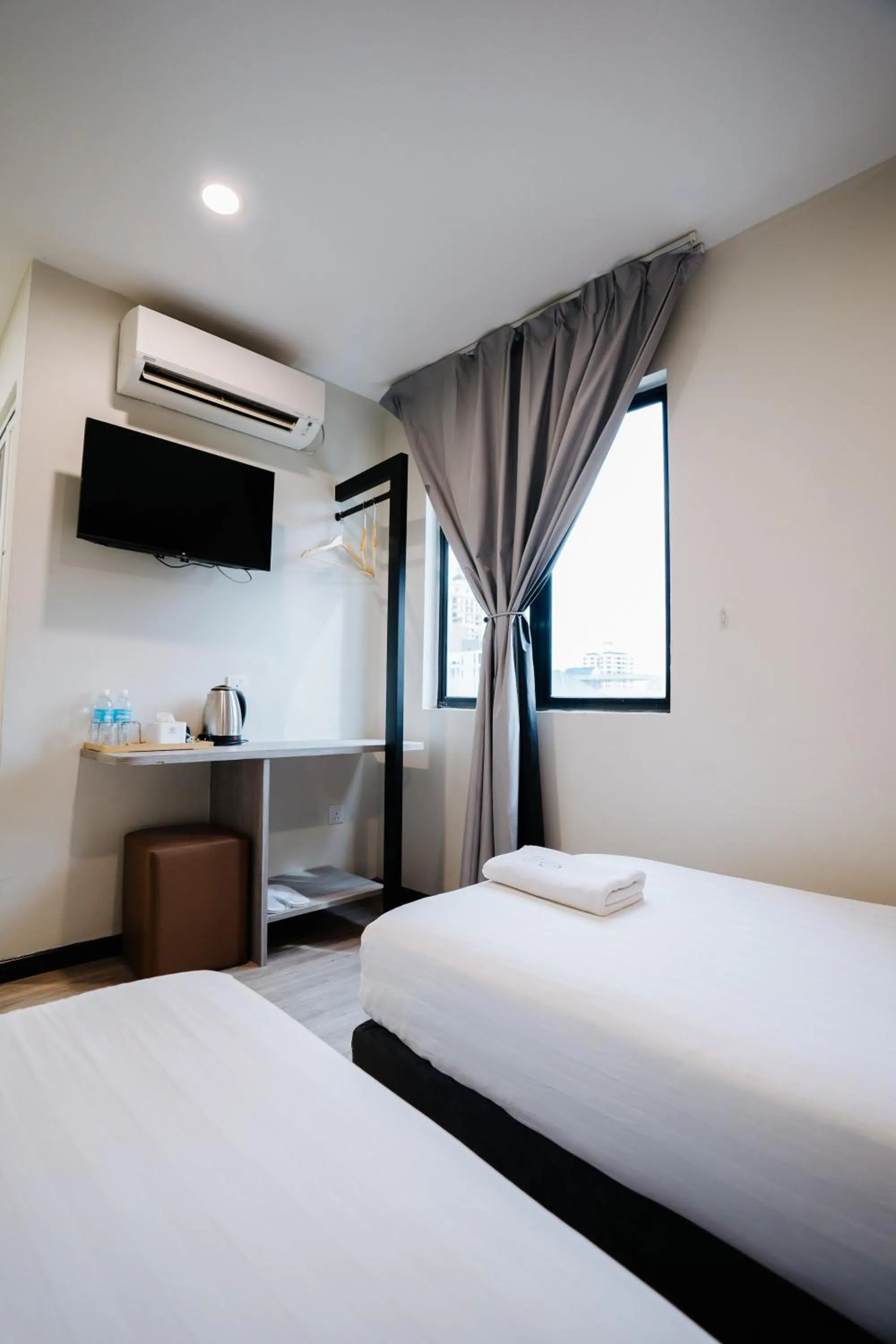 Bed in Wangs Hotel Gurney Drive