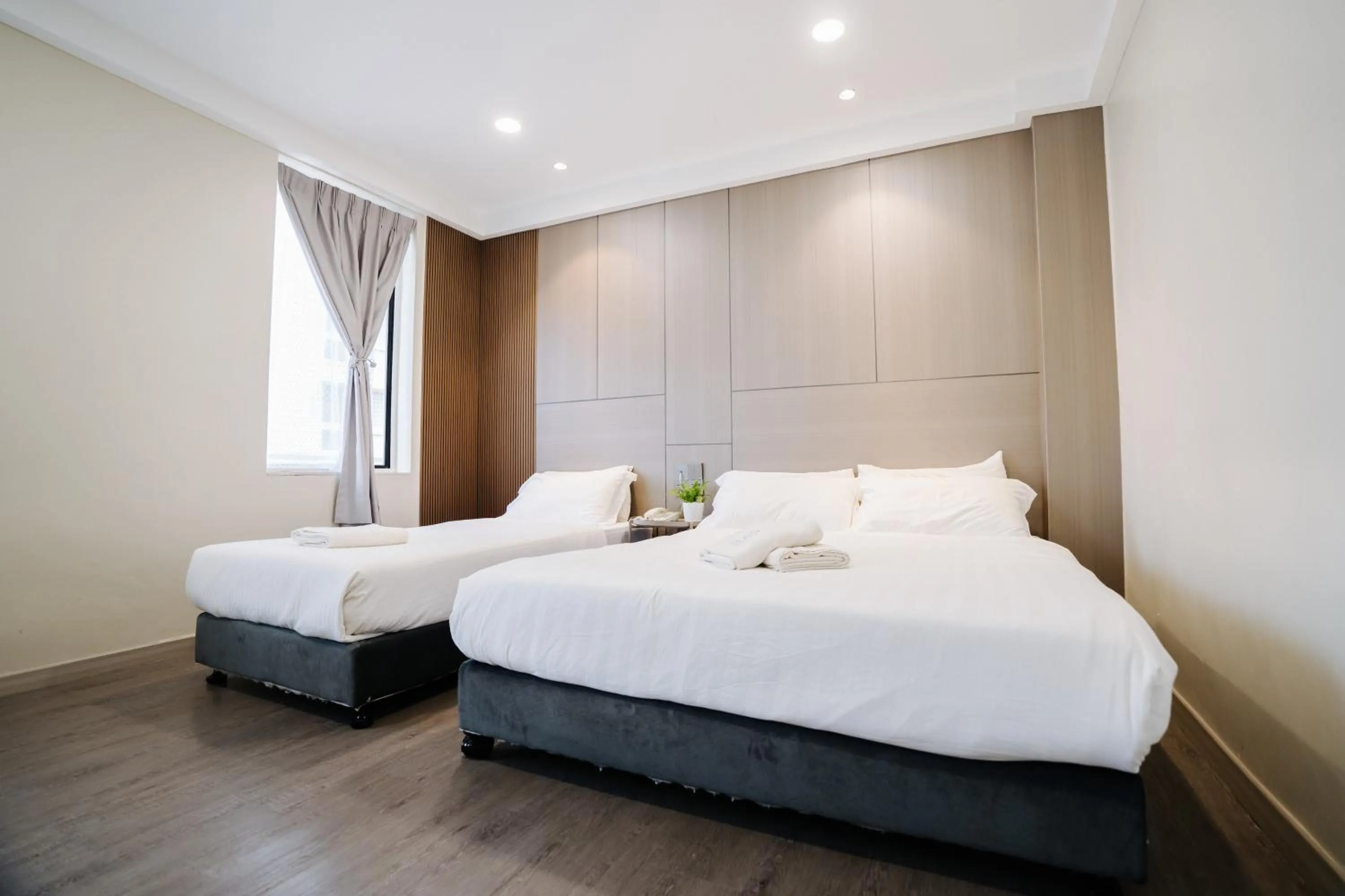 Bed in Wangs Hotel Gurney Drive