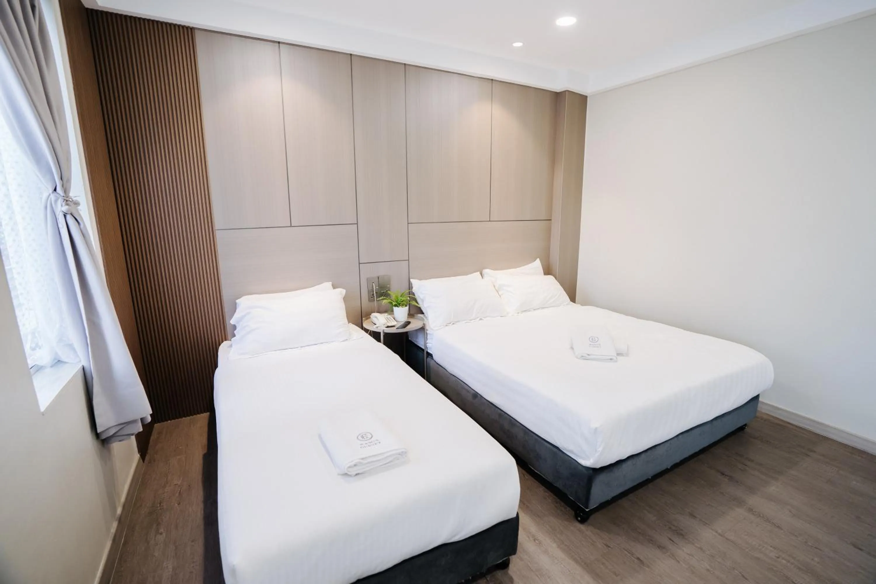 Bed in Wangs Hotel Gurney Drive