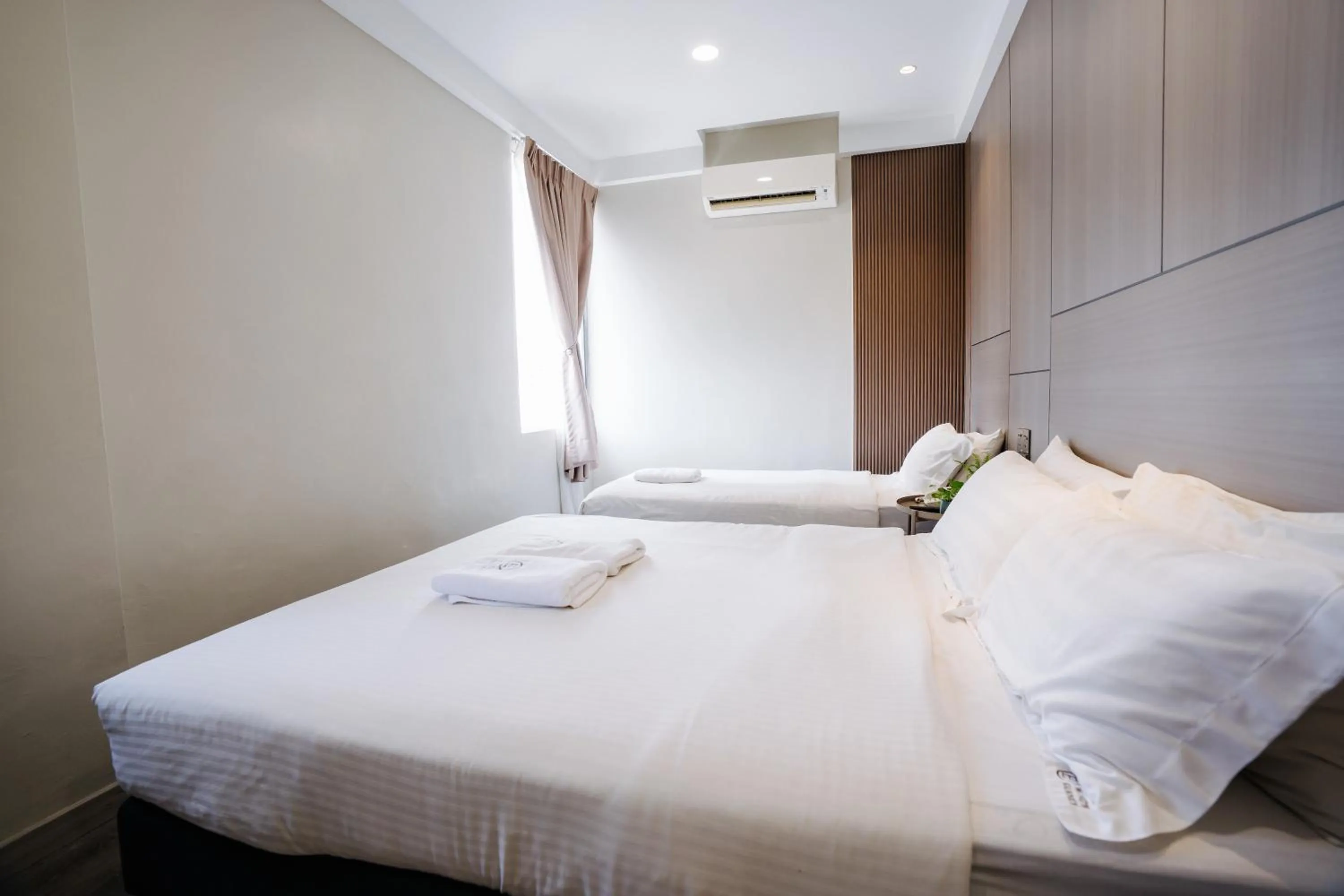 Bed in Wangs Hotel Gurney Drive