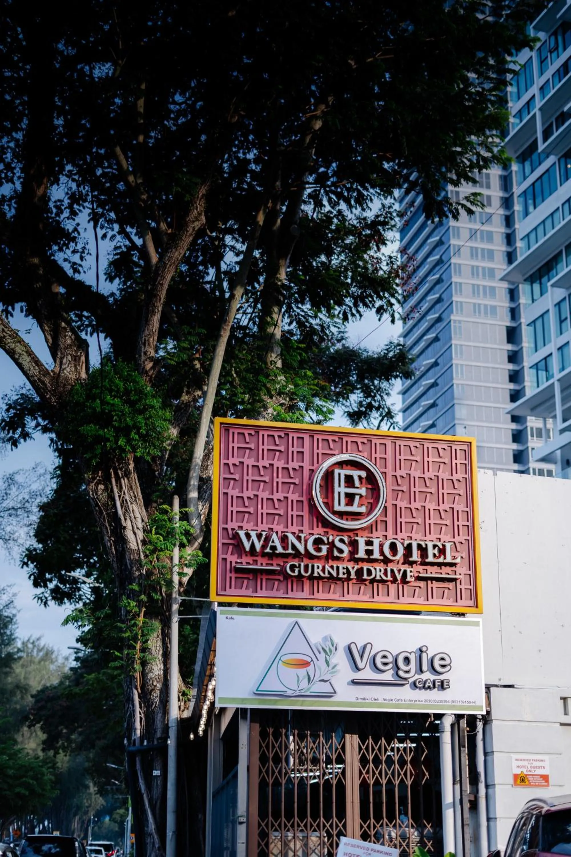 Property logo or sign in Wangs Hotel Gurney Drive
