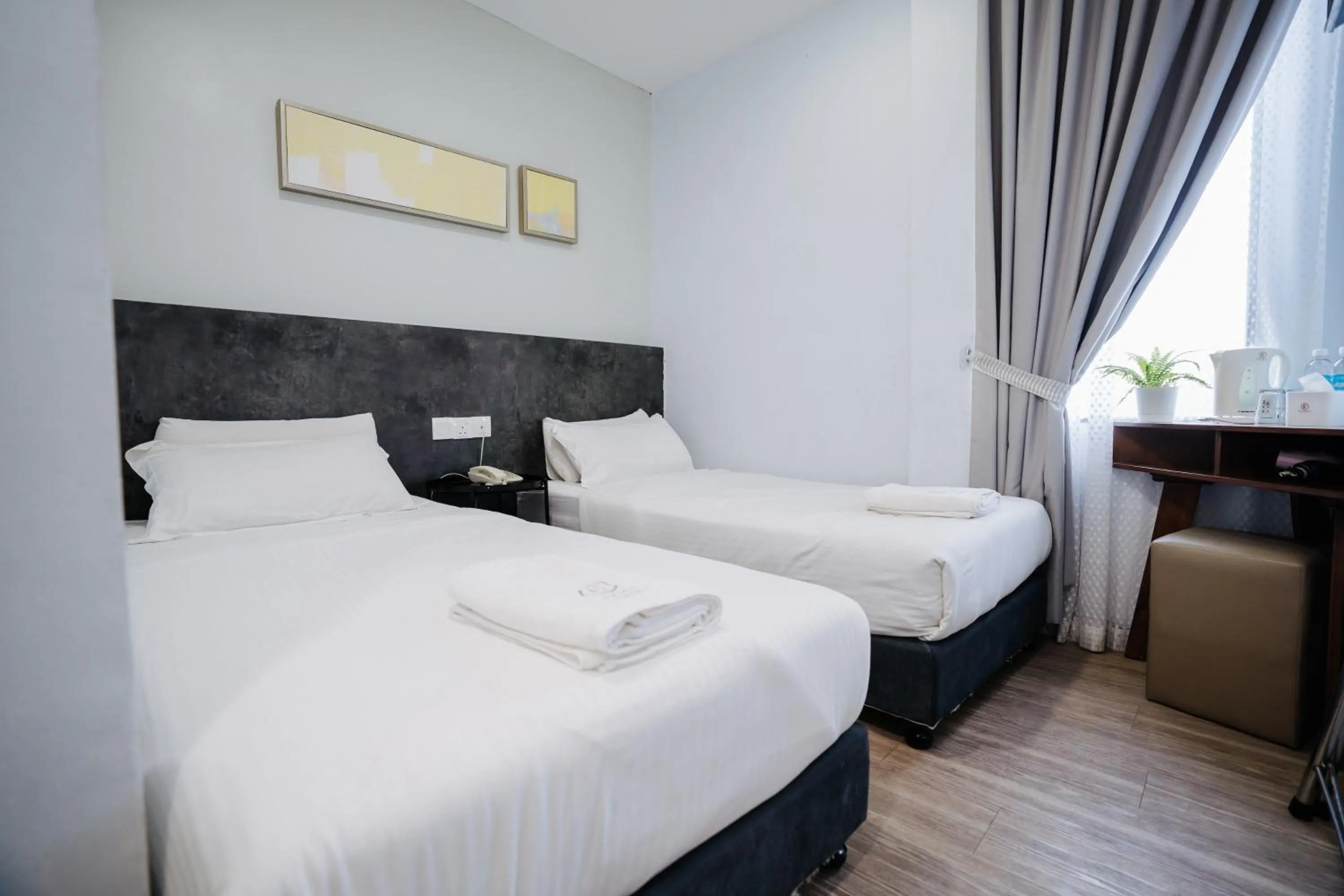 Bed in Wangs Hotel Gurney Drive