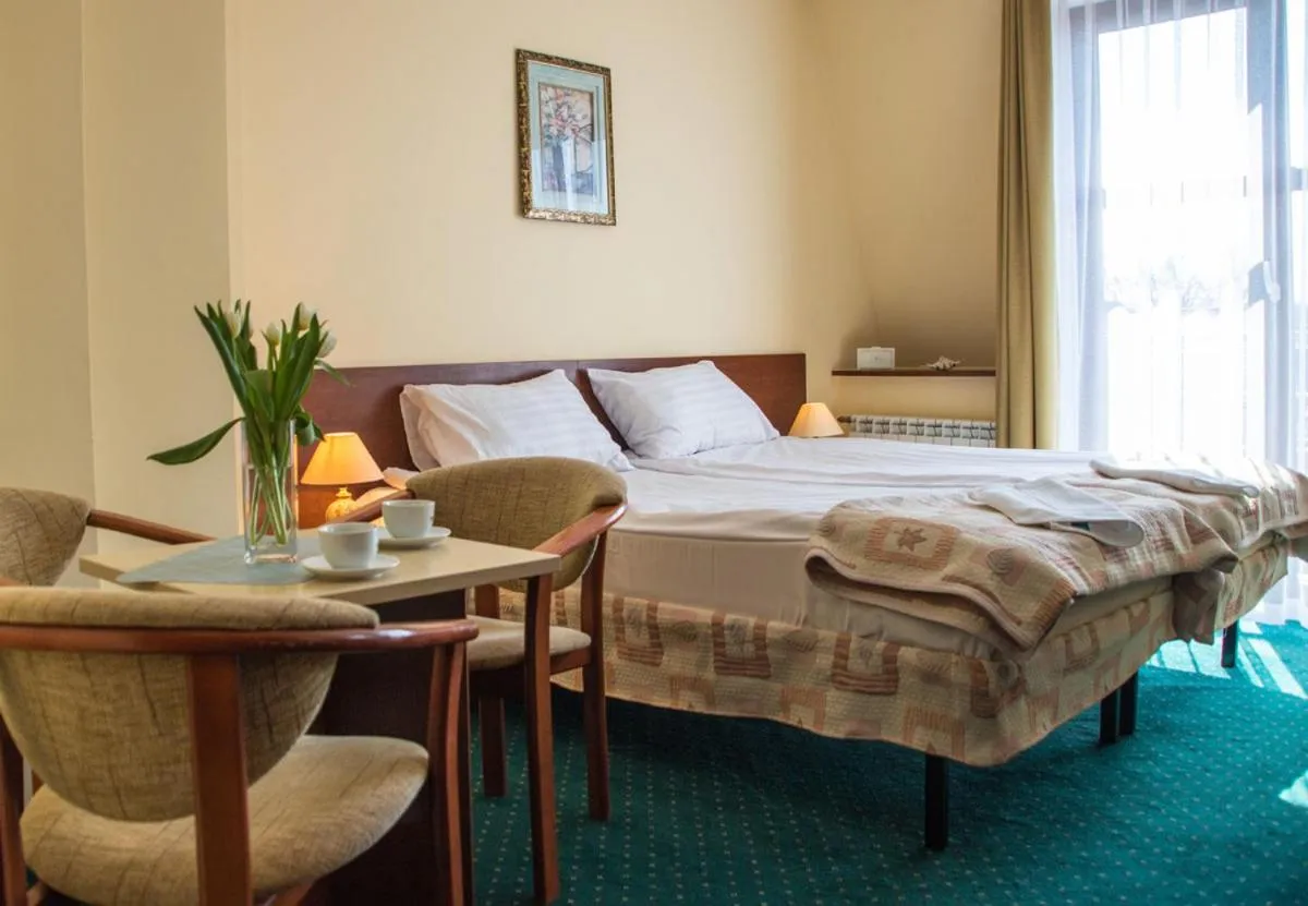 Bed in Hotel Aleksander