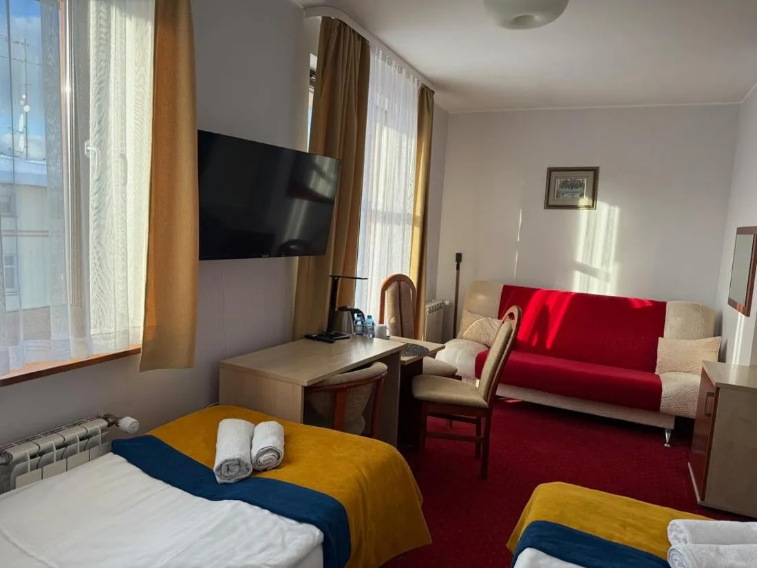 Bed in Hotel Aleksander