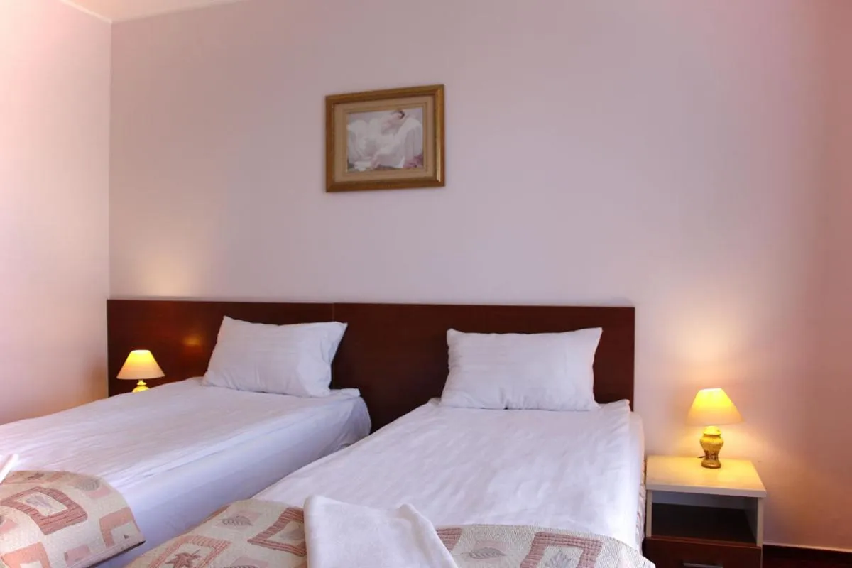 Bed in Hotel Aleksander