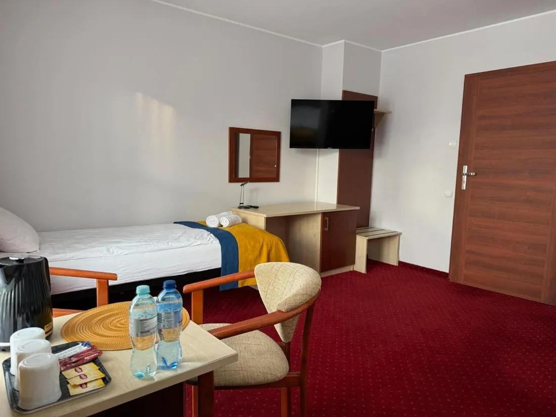 Bed in Hotel Aleksander