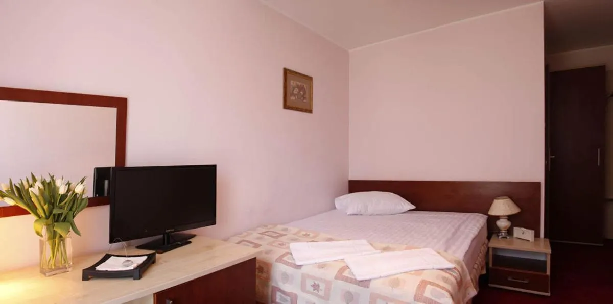 Bed in Hotel Aleksander