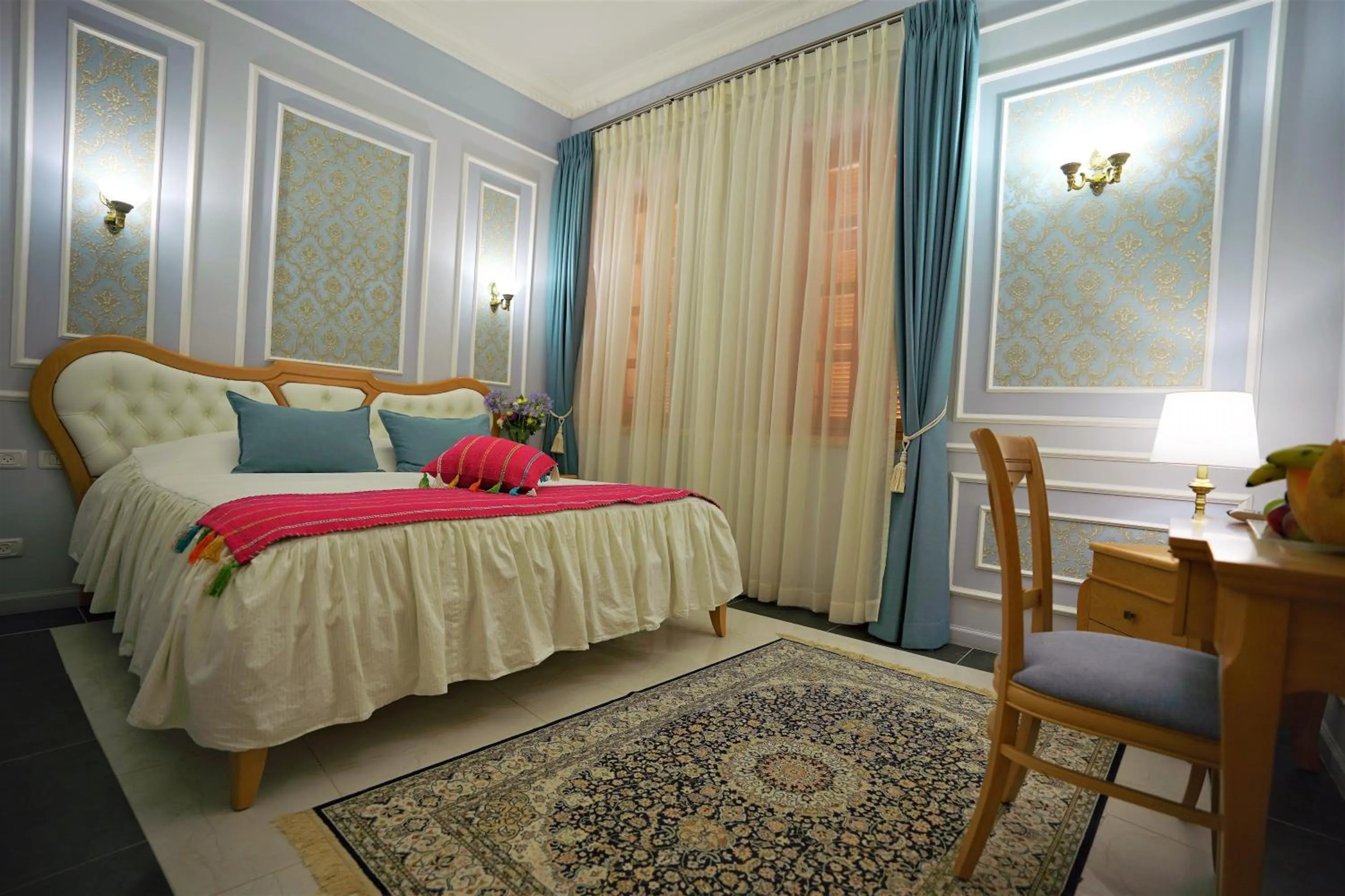 Bed in Sergei Palace Hotel