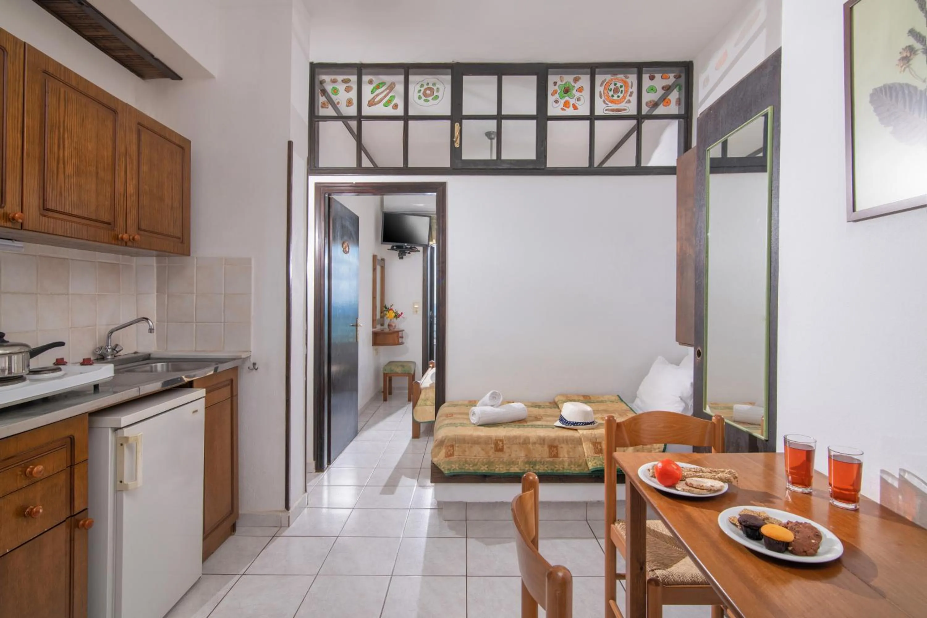 Kitchen or kitchenette in Iliostasi Beach Apartments