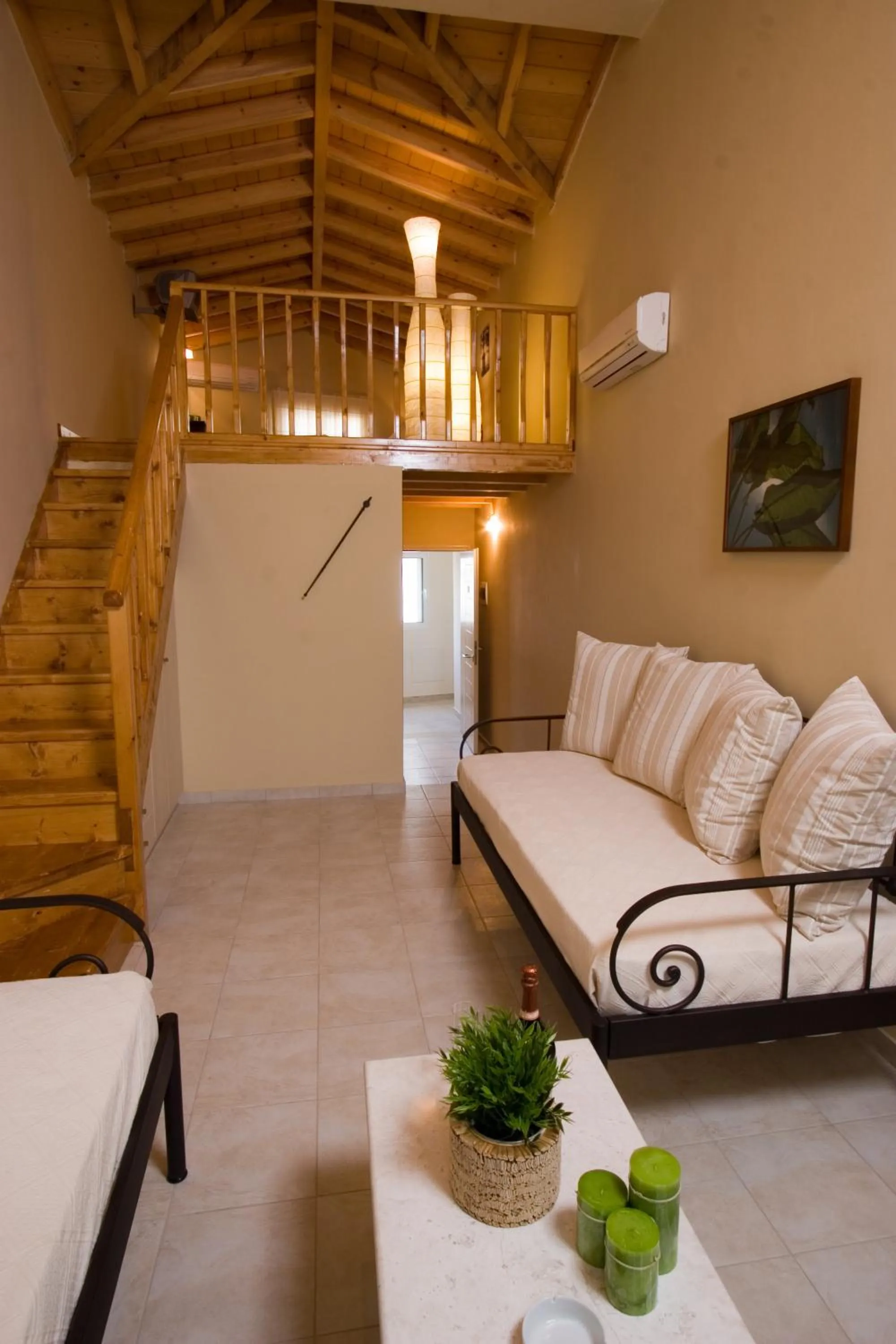 Bed in Oasis Beach Hotel