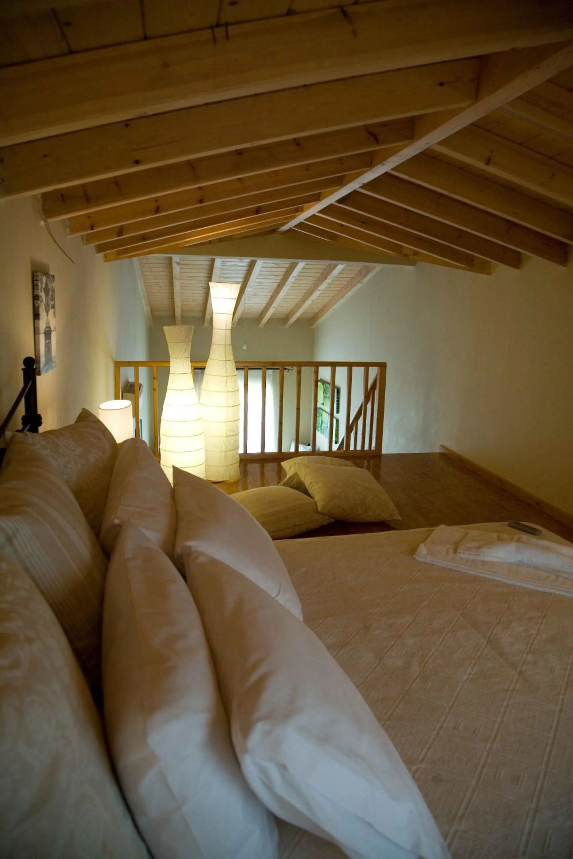 Bed in Oasis Beach Hotel