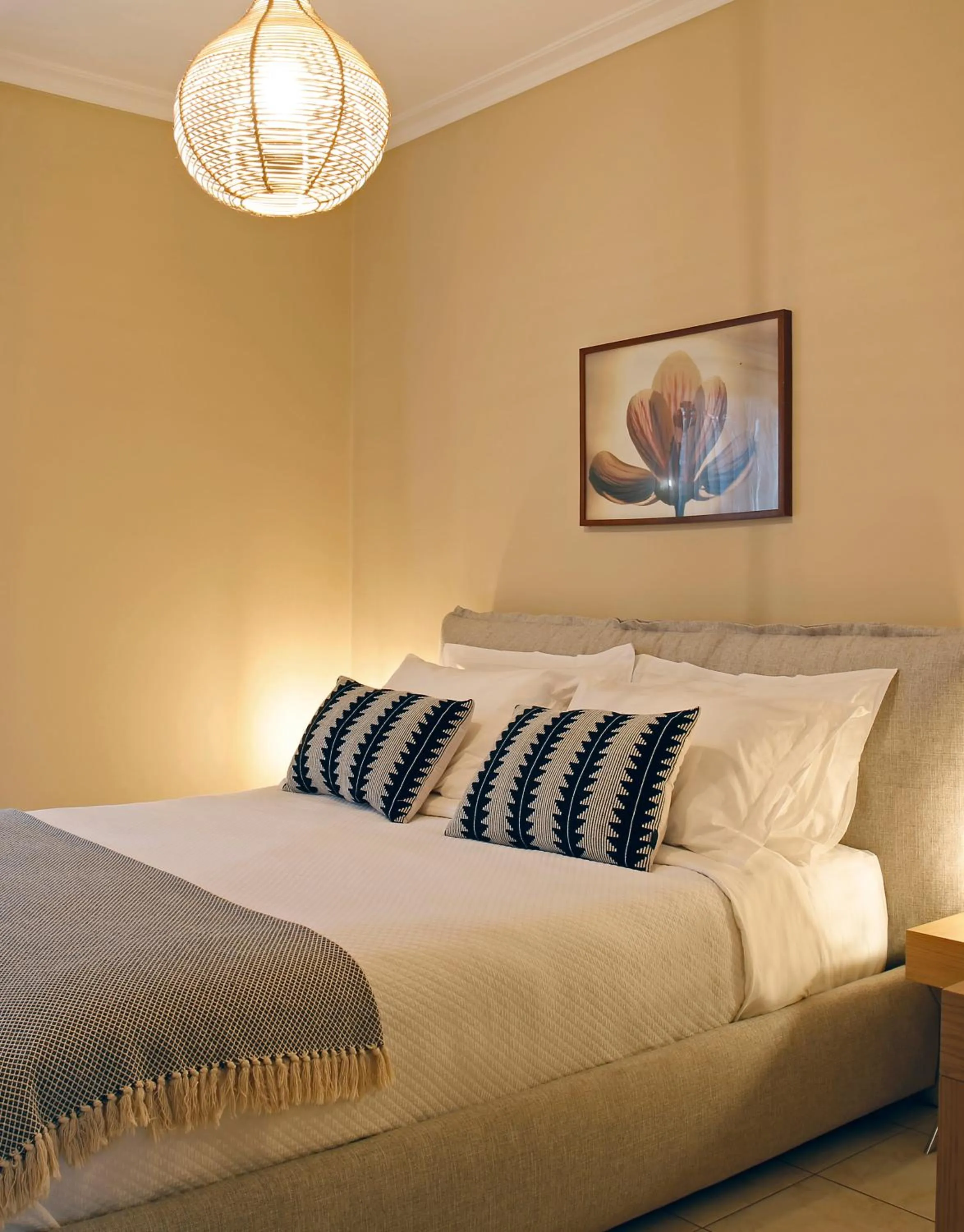 Bed in Oasis Beach Hotel