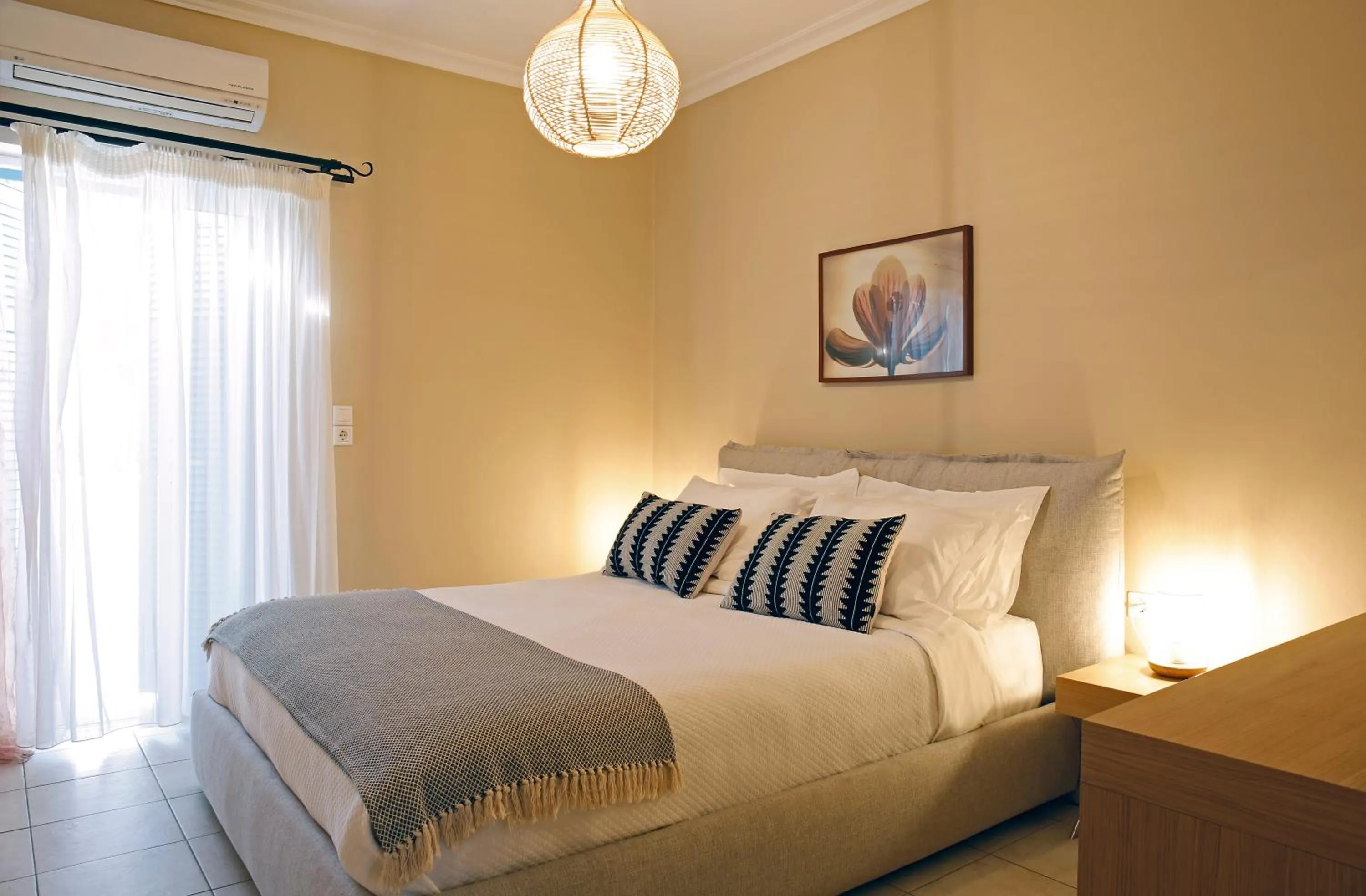 Bed in Oasis Beach Hotel