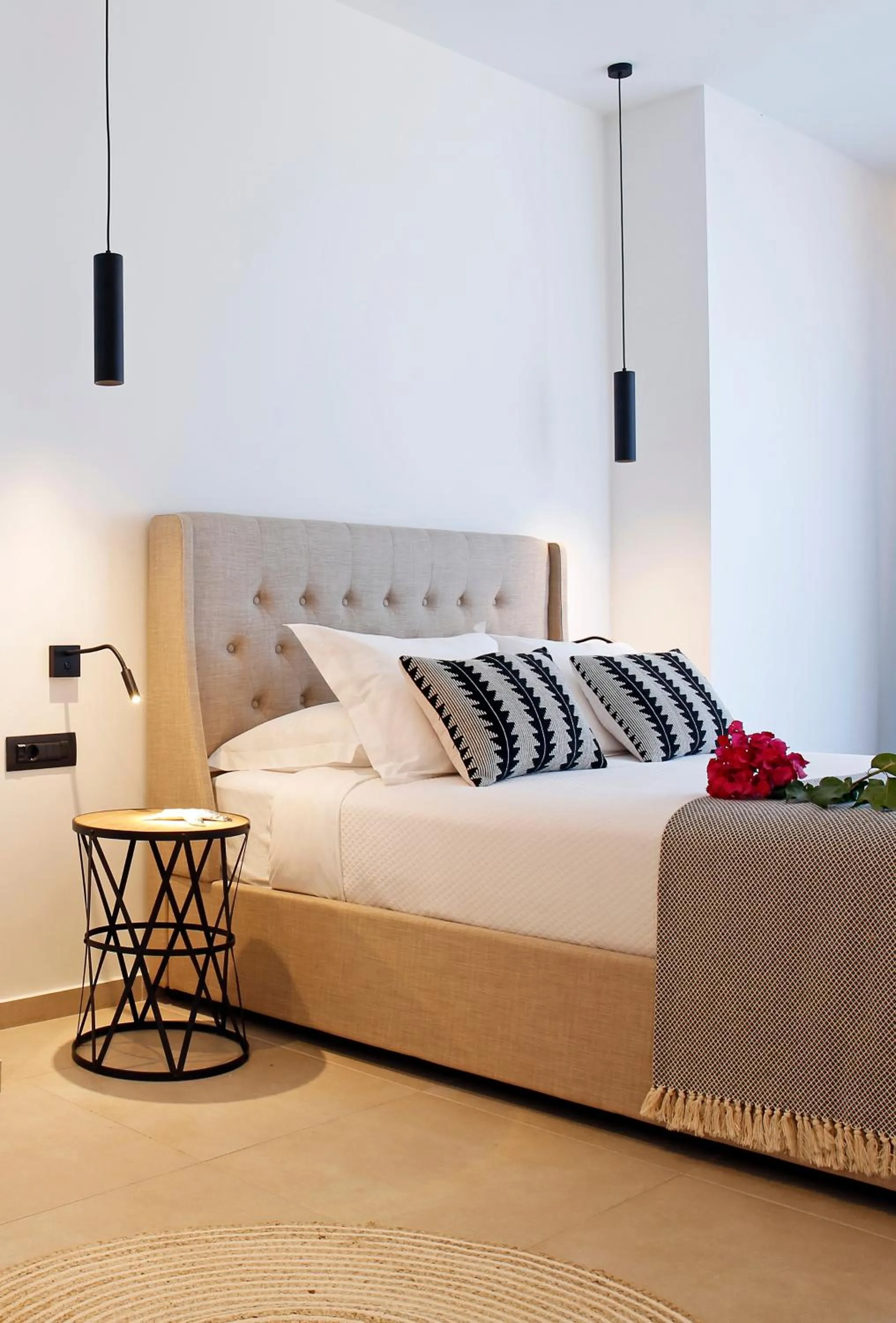 Bed in Oasis Beach Hotel