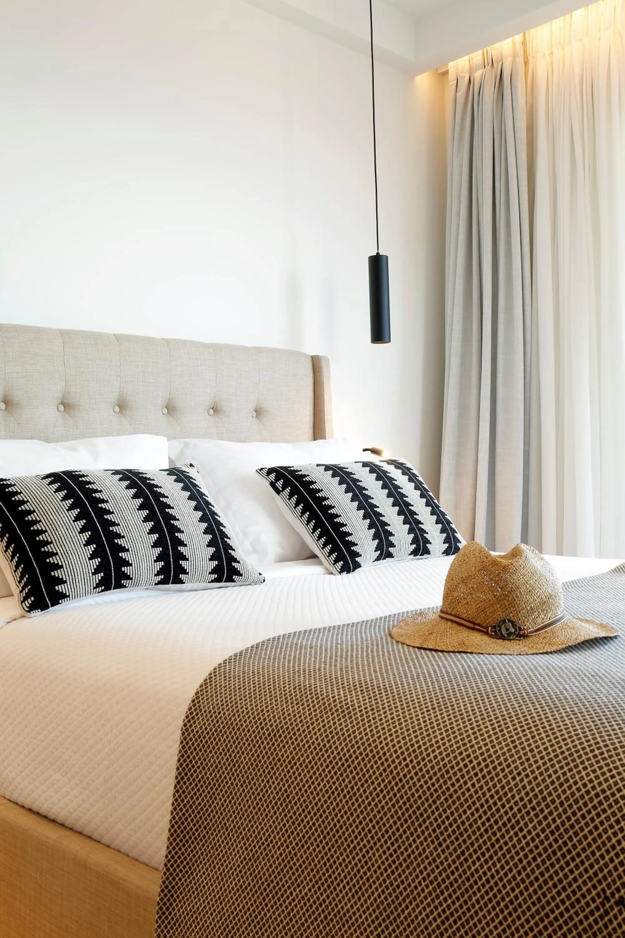 Bed in Oasis Beach Hotel