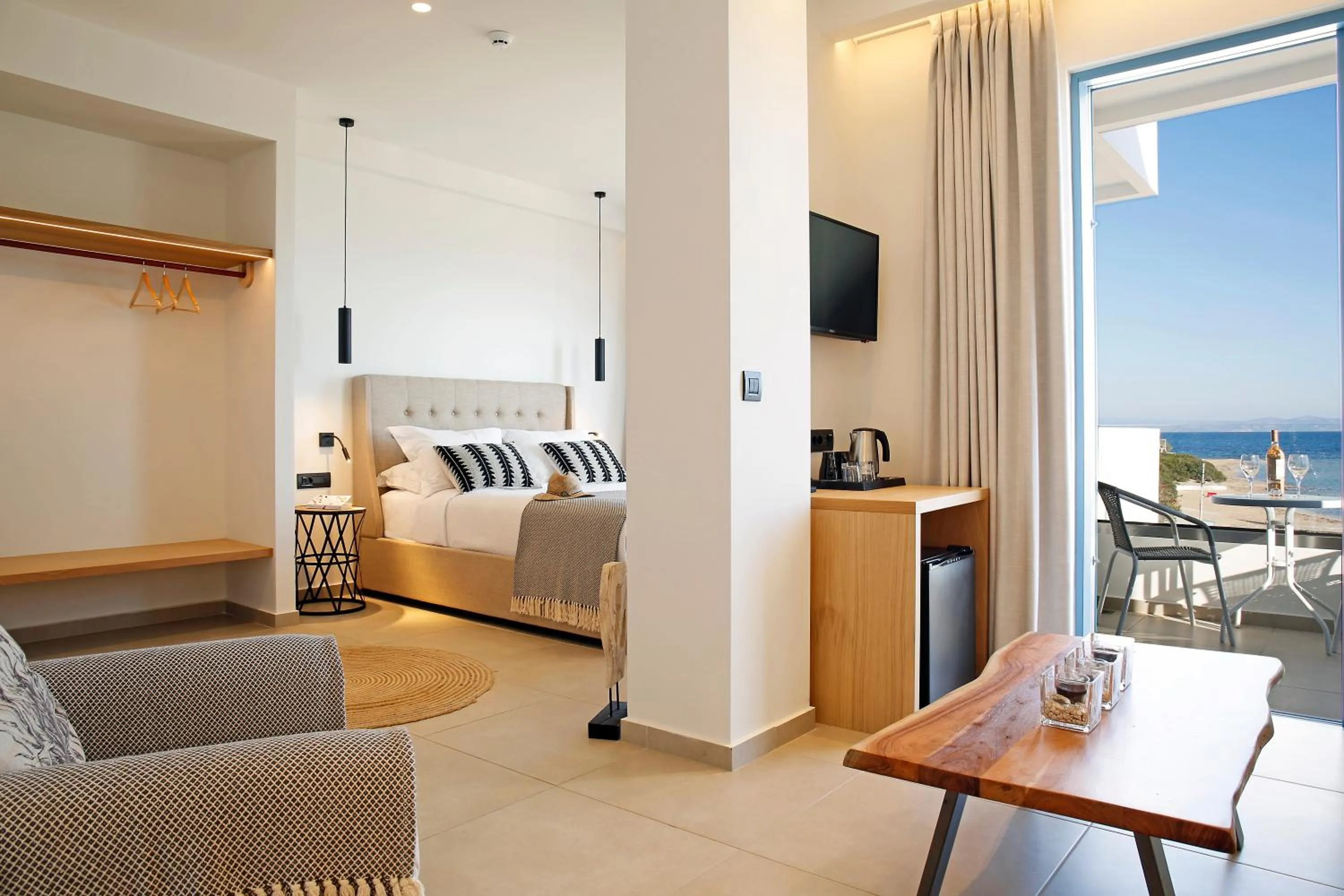 Bed in Oasis Beach Hotel