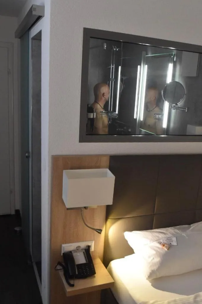 Bathroom, Bed in Hotel Hamann