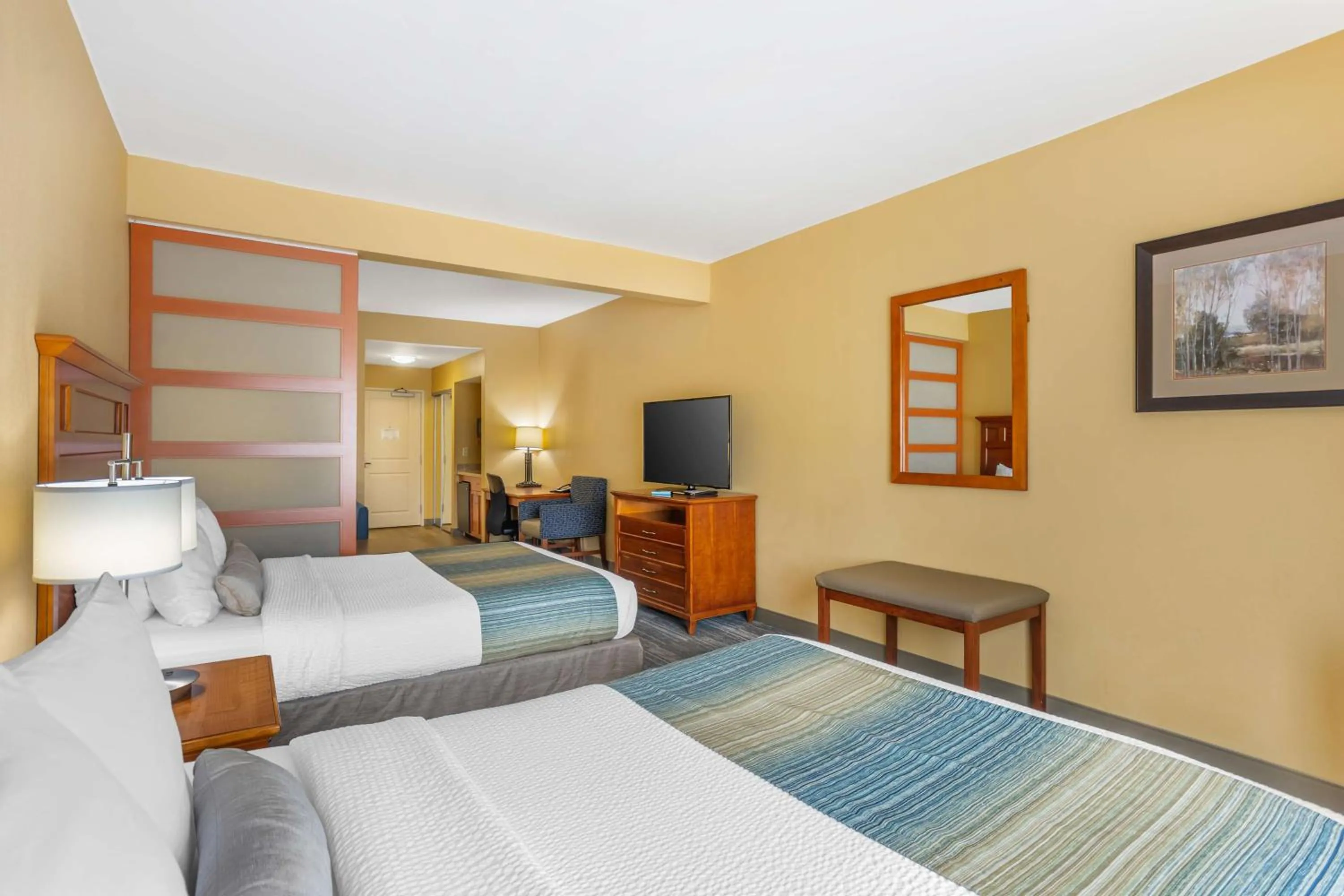 Bedroom, Bed in Best Western PLUS University Park Inn & Suites