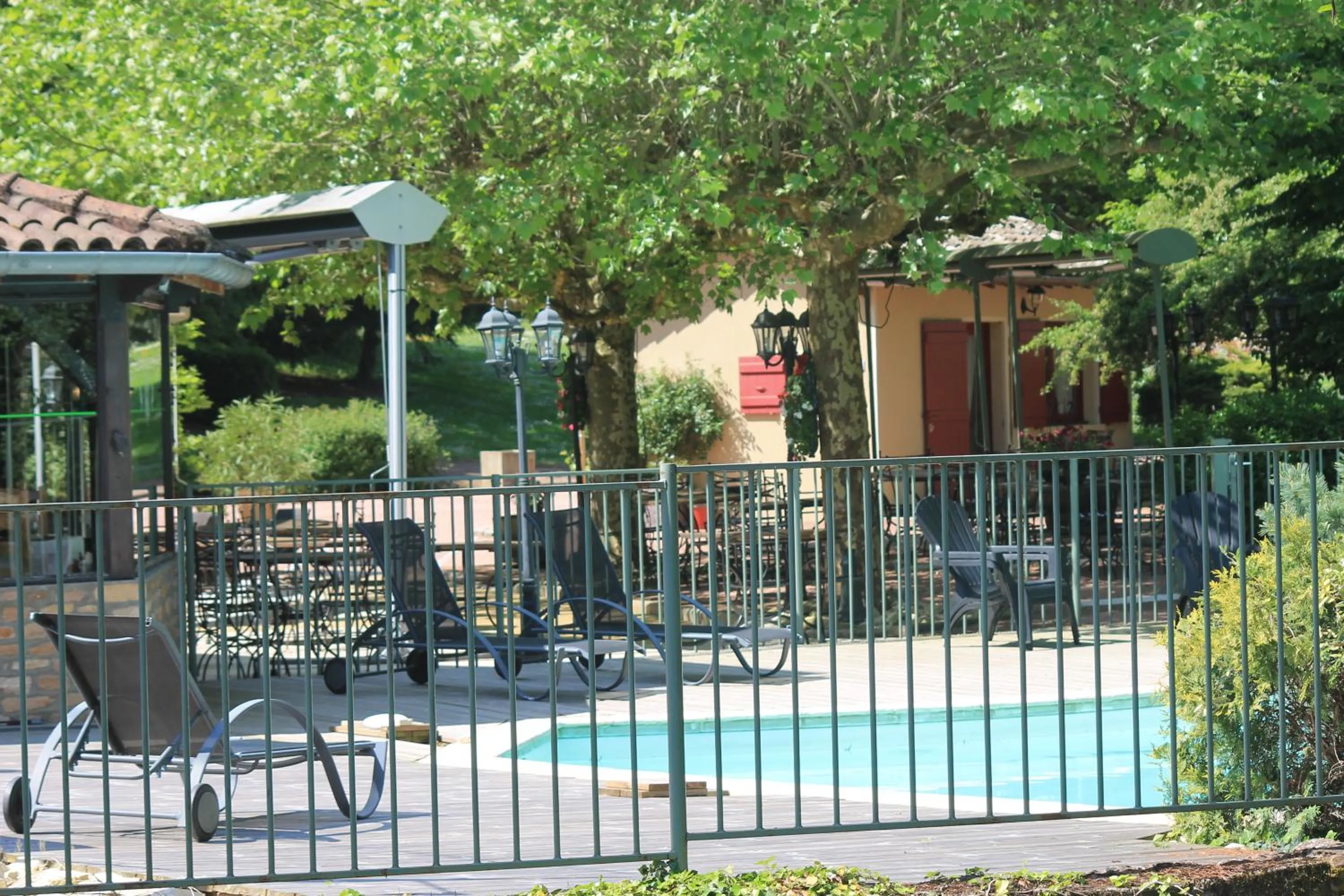 Swimming pool in Hôtel Restaurant Le Moulin de Saint Verand