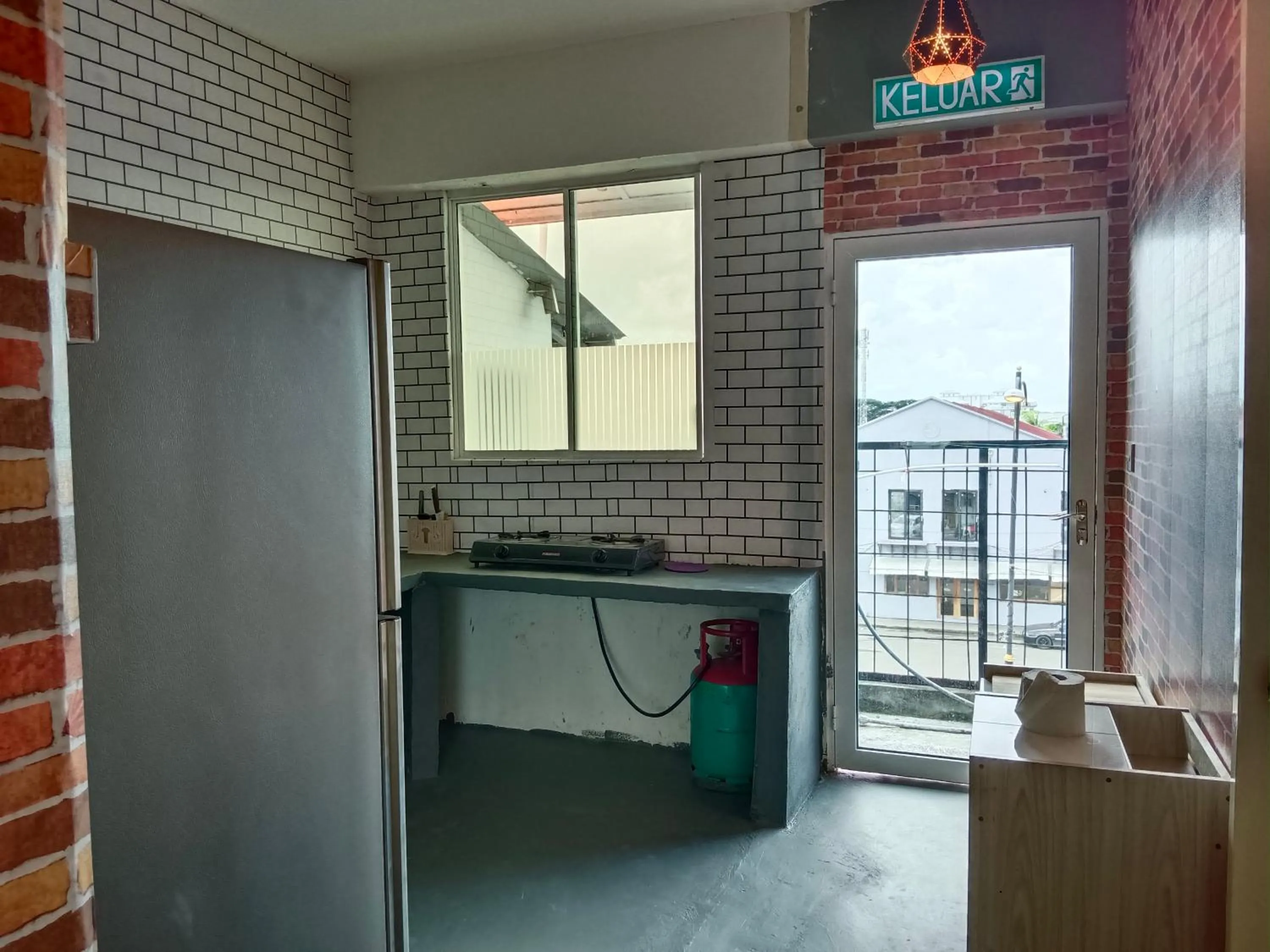 Kitchen or kitchenette in Cow B Homestay Semporna