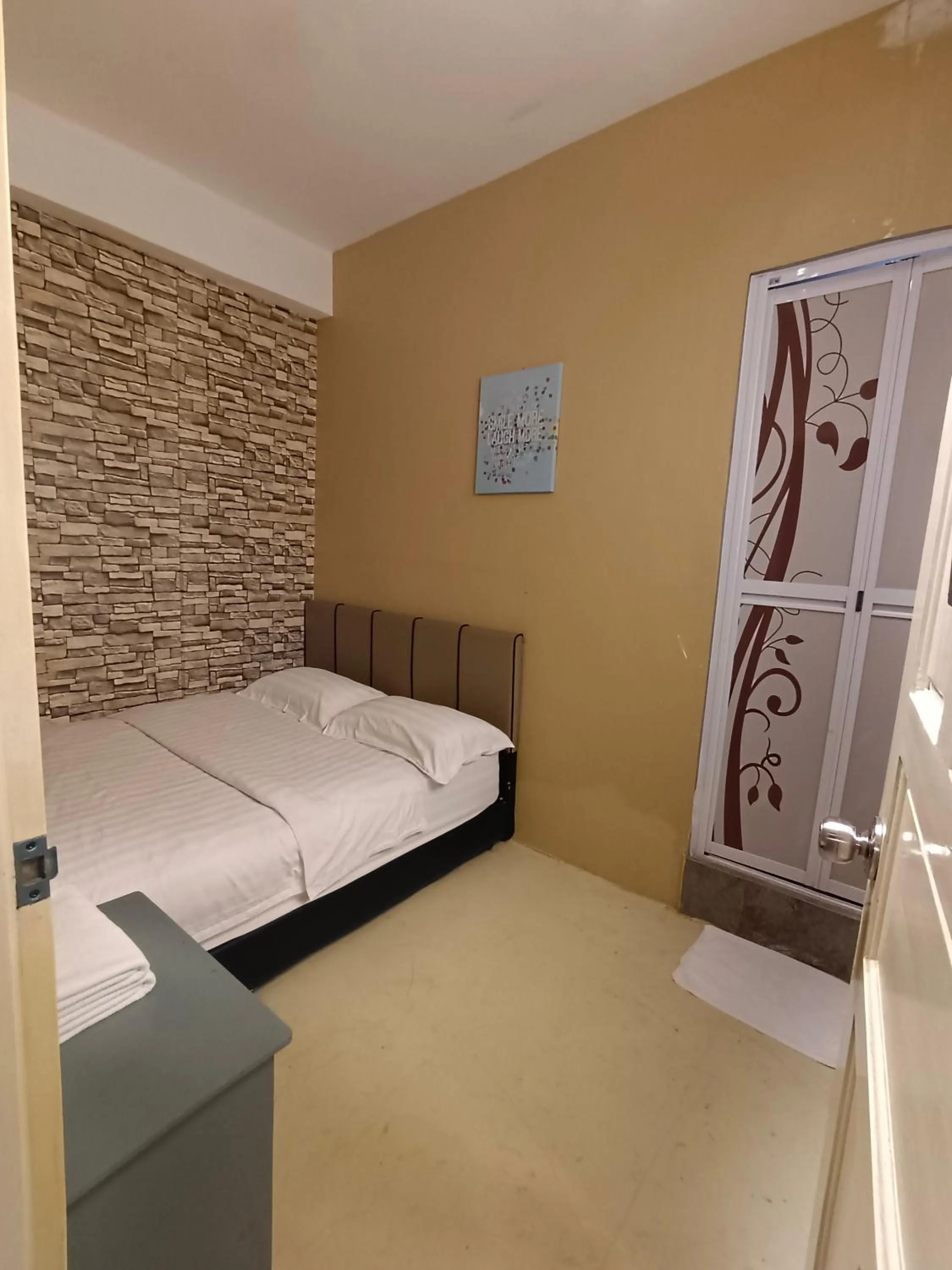 Bed in Cow B Homestay Semporna