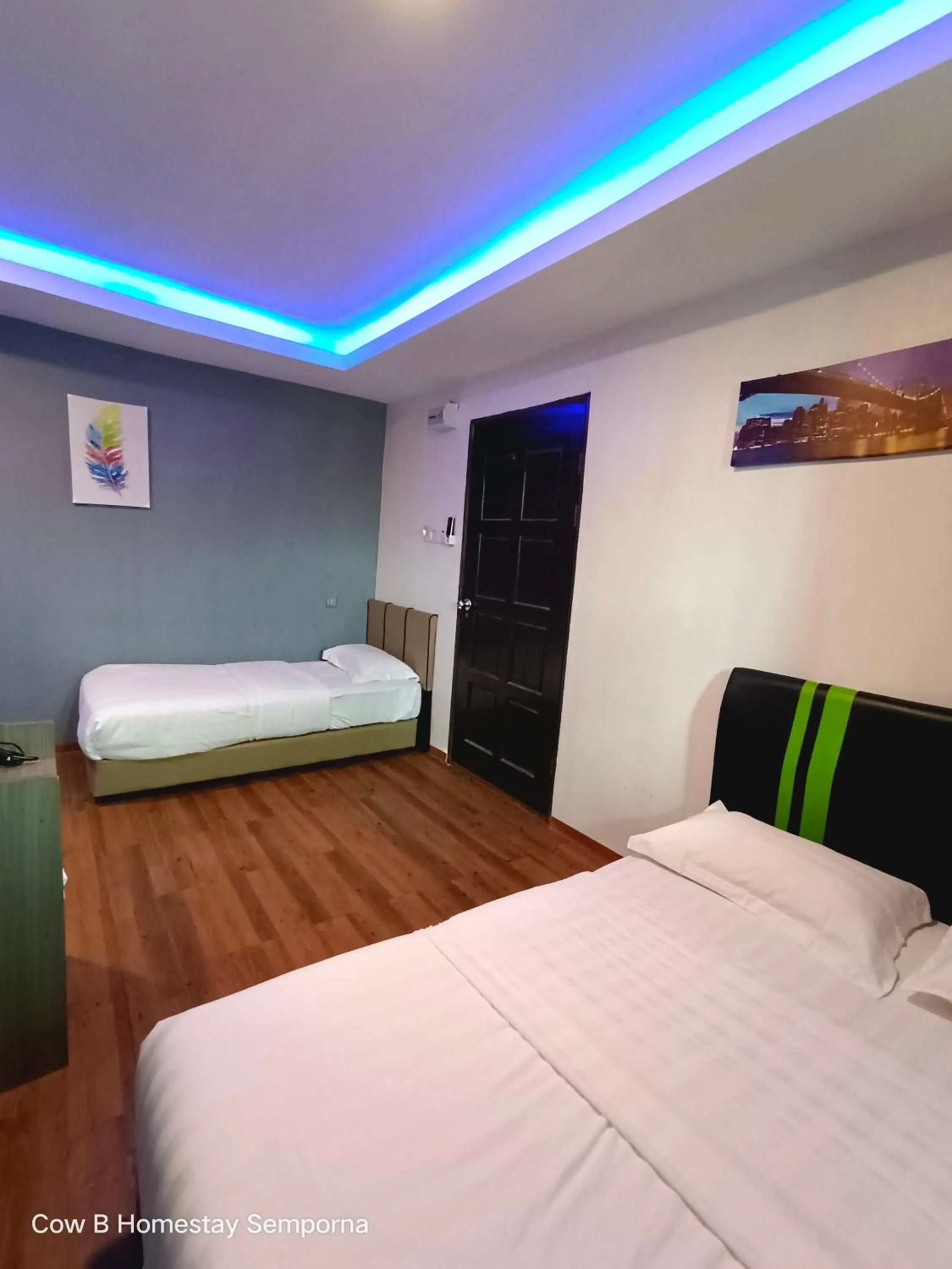 Photo of the whole room, Bed in Cow B Homestay Semporna