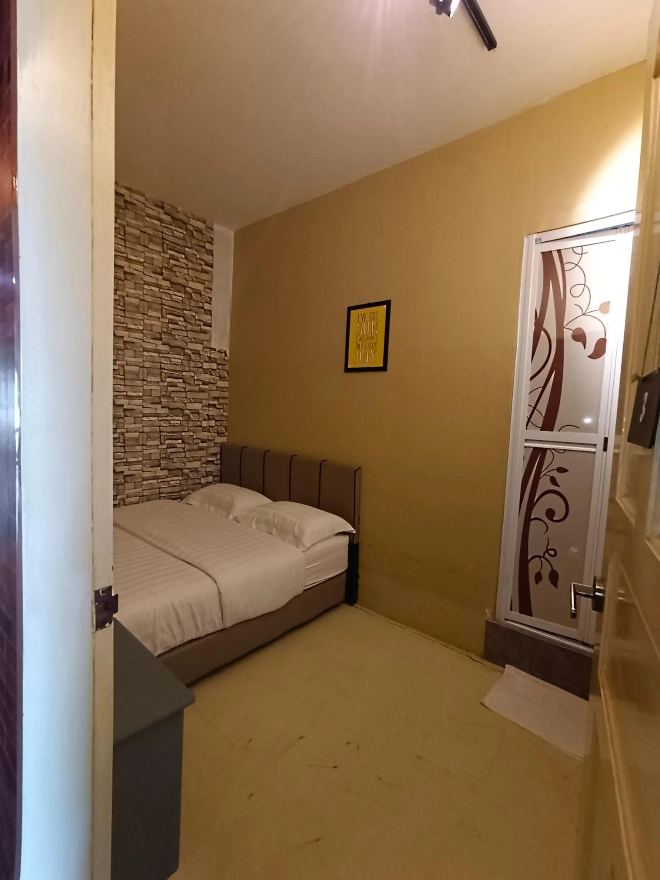 Bed in Cow B Homestay Semporna