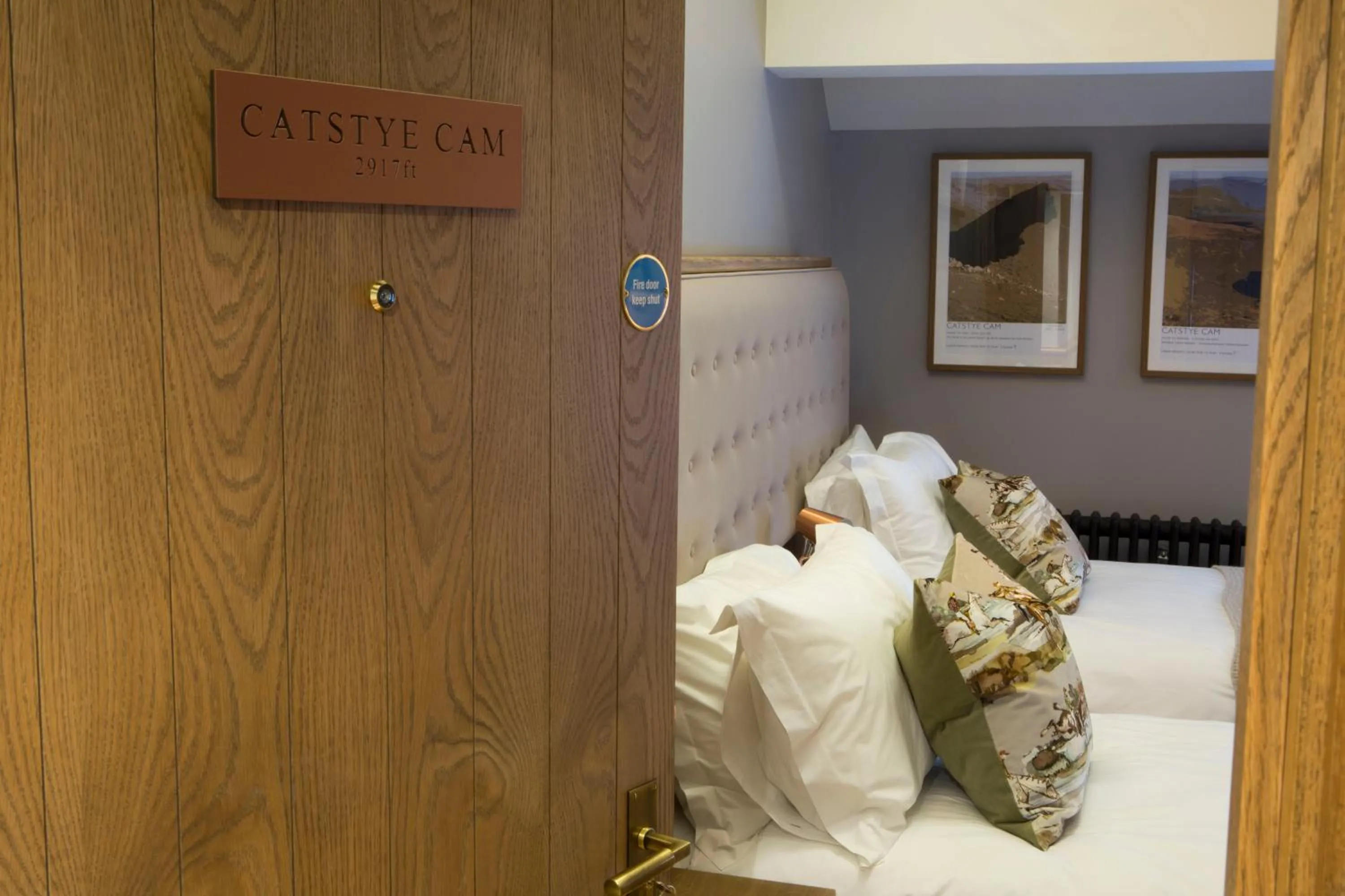 Decorative detail, Bed in The Queen's Head Hotel