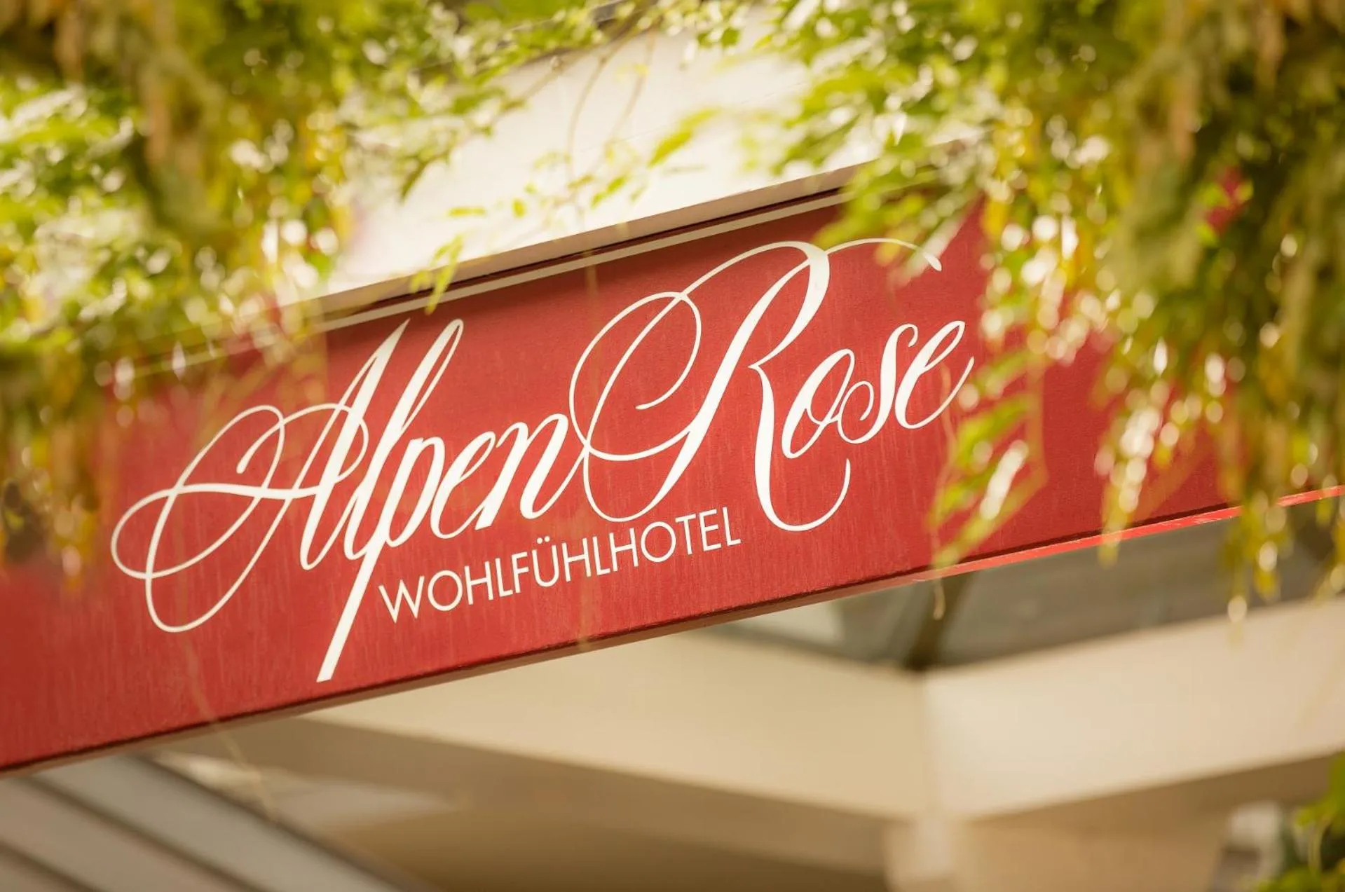 Property logo or sign in Hotel Alpenrose