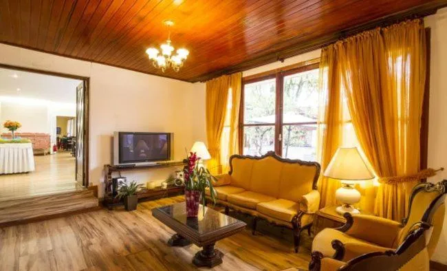 Communal lounge/ TV room in Hotel Bologna