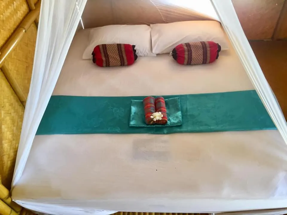 Bed in Koh Phaluai Beach Bangalow