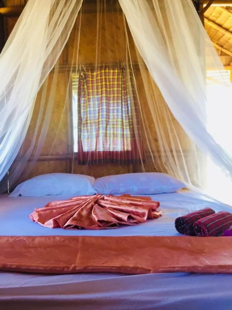 Bed in Koh Phaluai Beach Bangalow