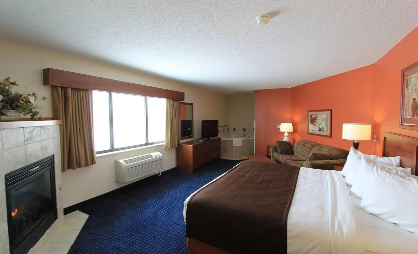 Photo of the whole room, Bed in AmericInn by Wyndham Cedar Rapids Airport