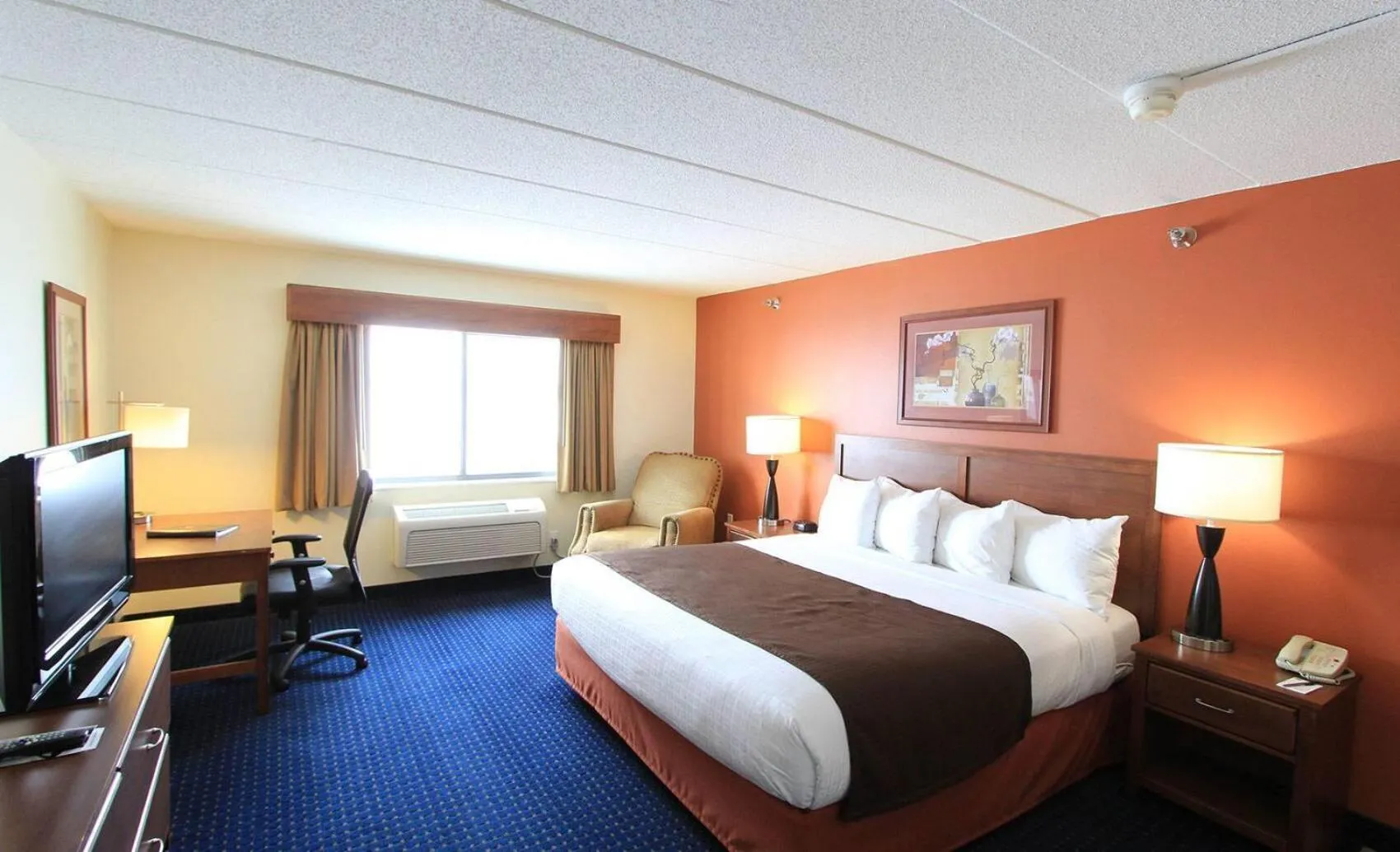 Photo of the whole room, Bed in AmericInn by Wyndham Cedar Rapids Airport