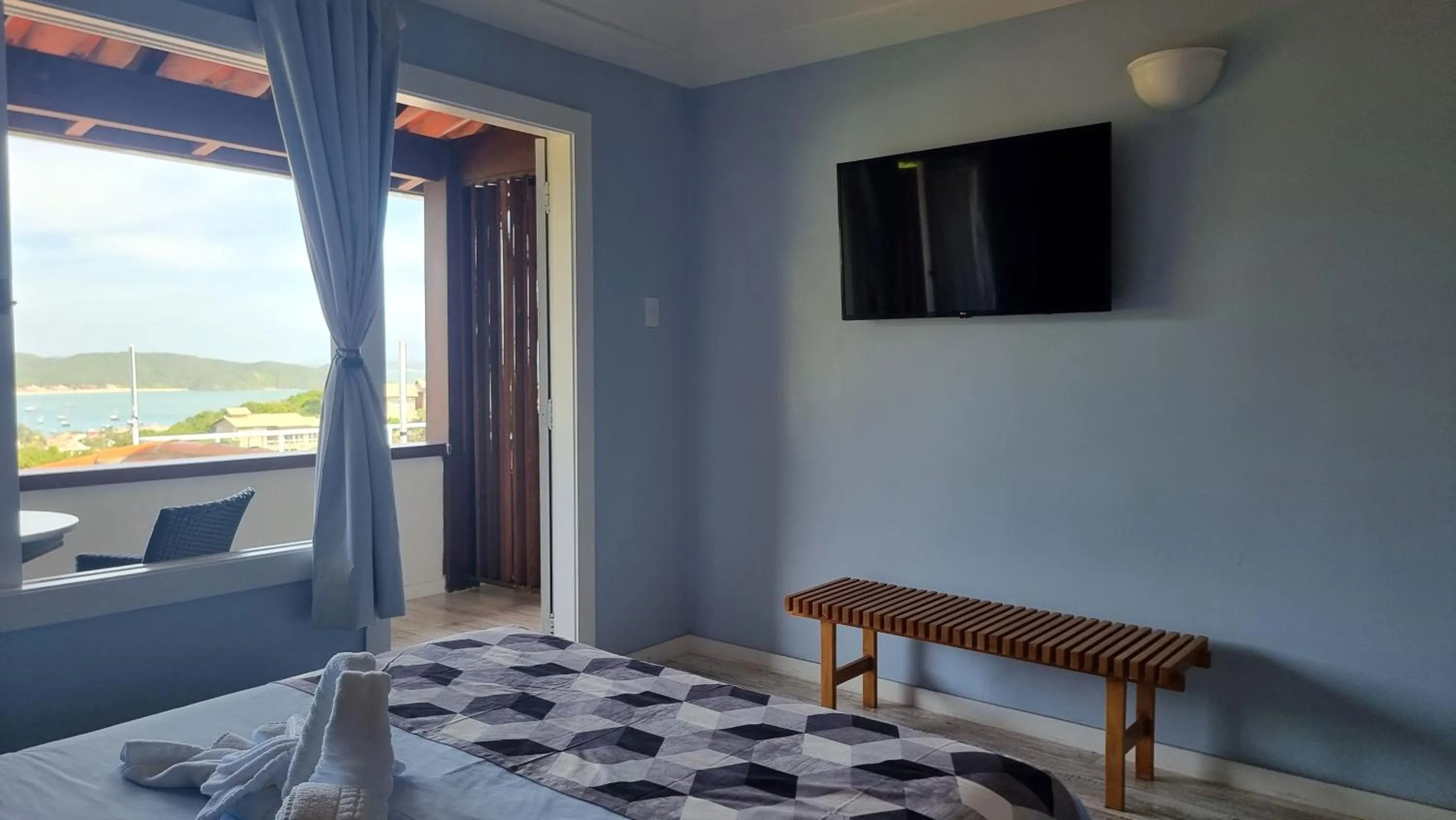 TV and multimedia, Bed in Pousada Santorini