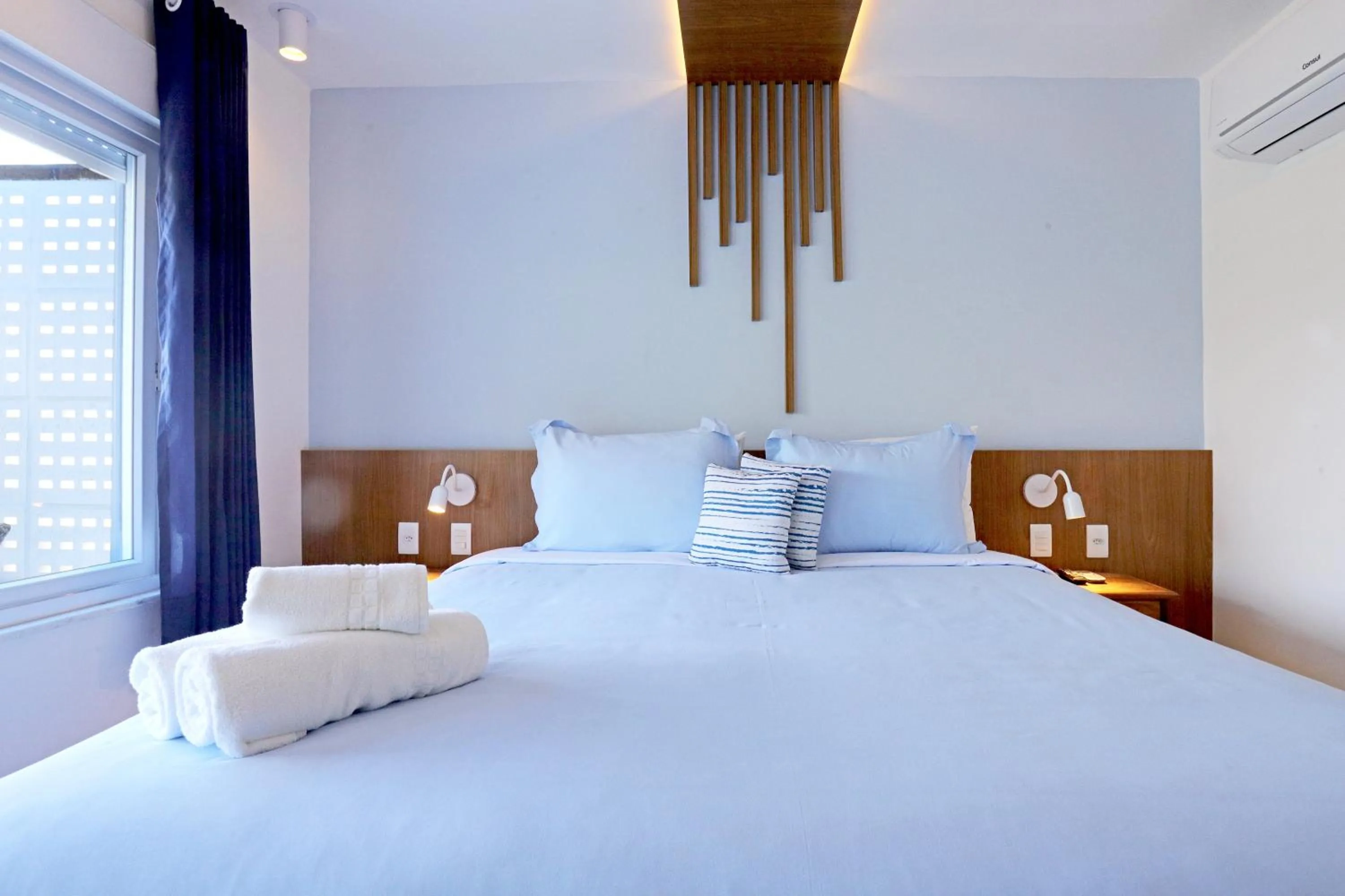 Bed in Pousada Santorini