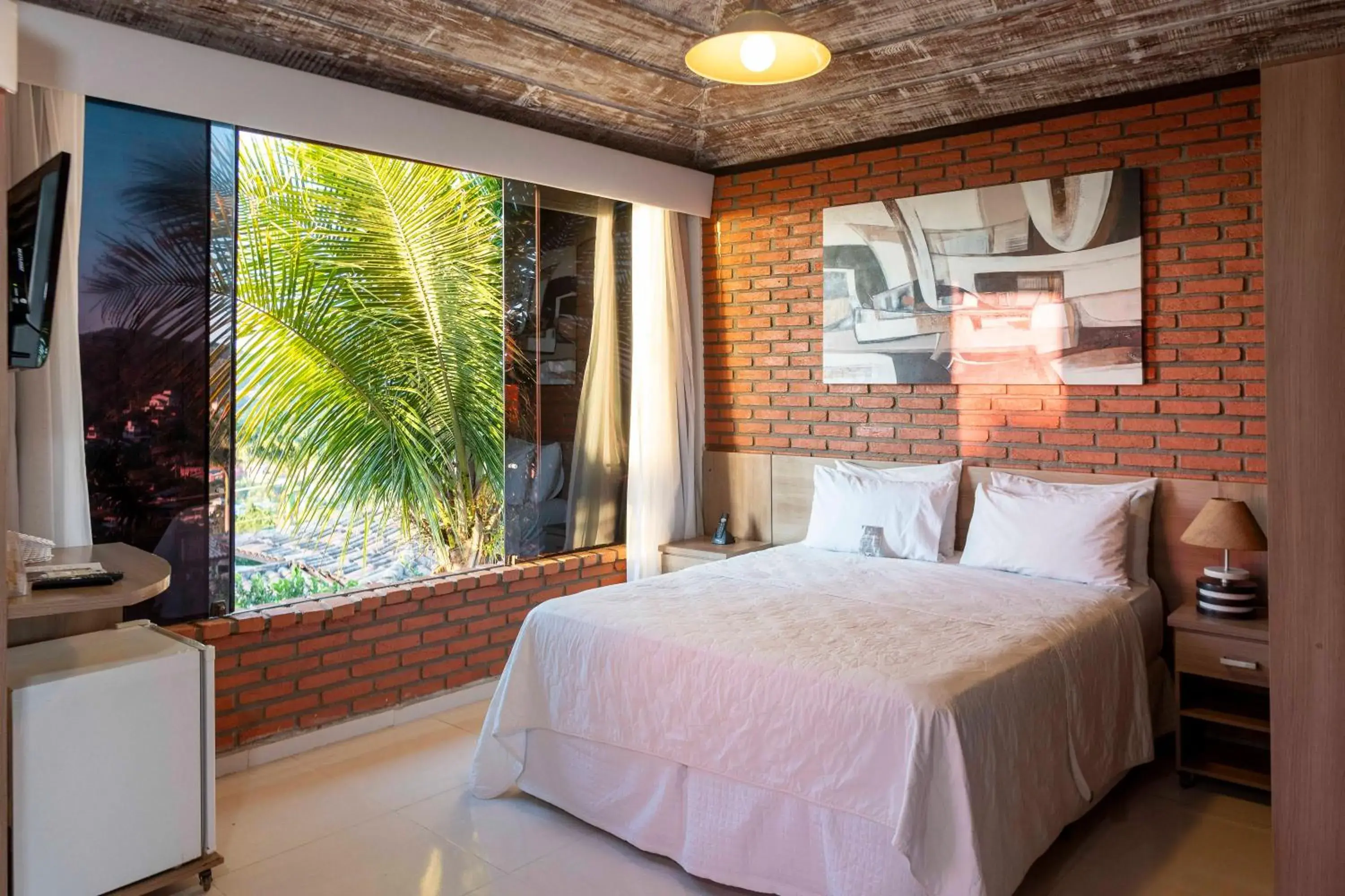 Standard Suite with Garden View in Costa do Sol Boutique Hotel Standard Suite with Garden View in Costa do Sol Boutique Hotel