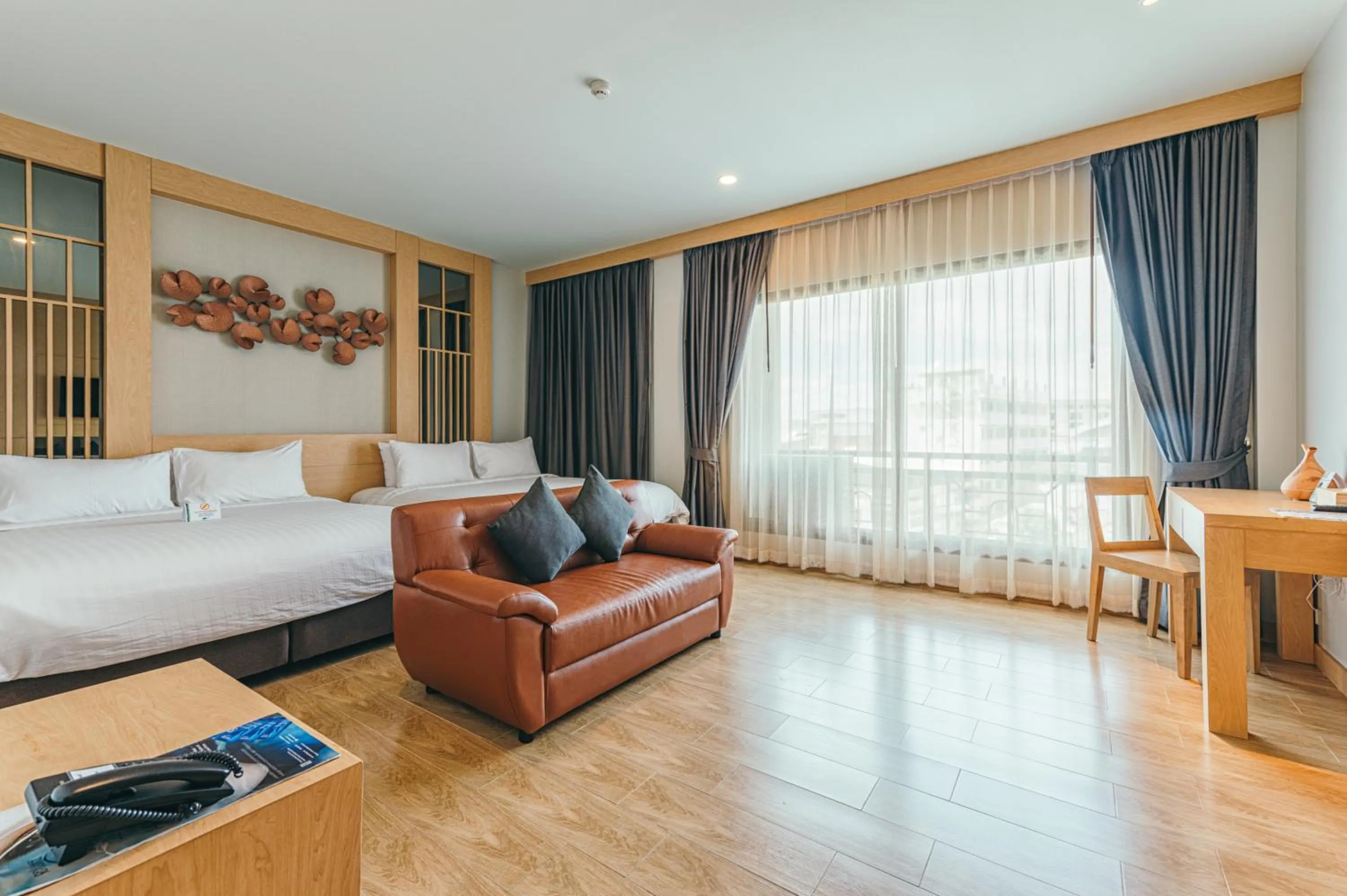 Seating area, Bed in Civilize Hotel