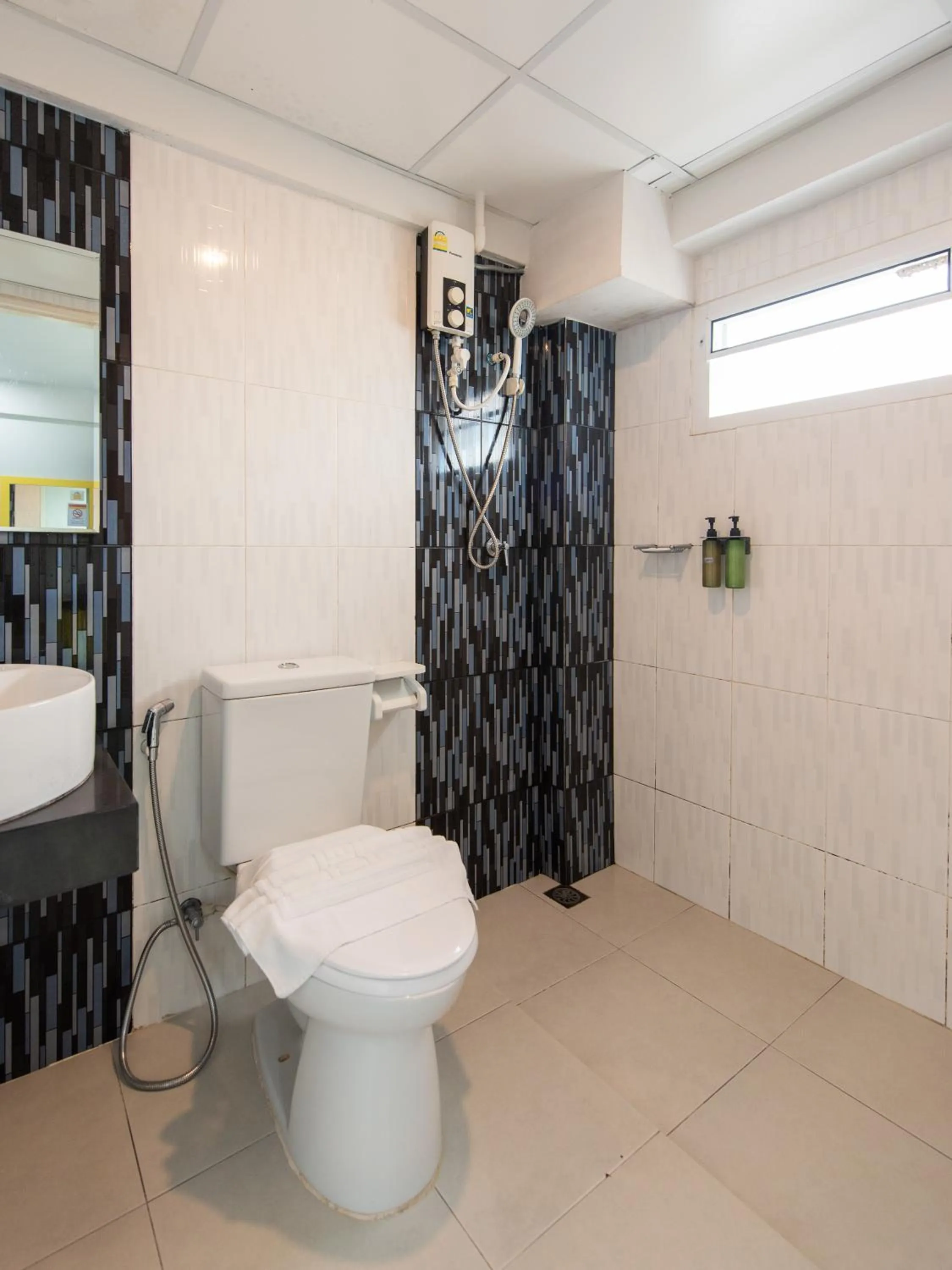 Bathroom in Riski Residence Bangbuathong