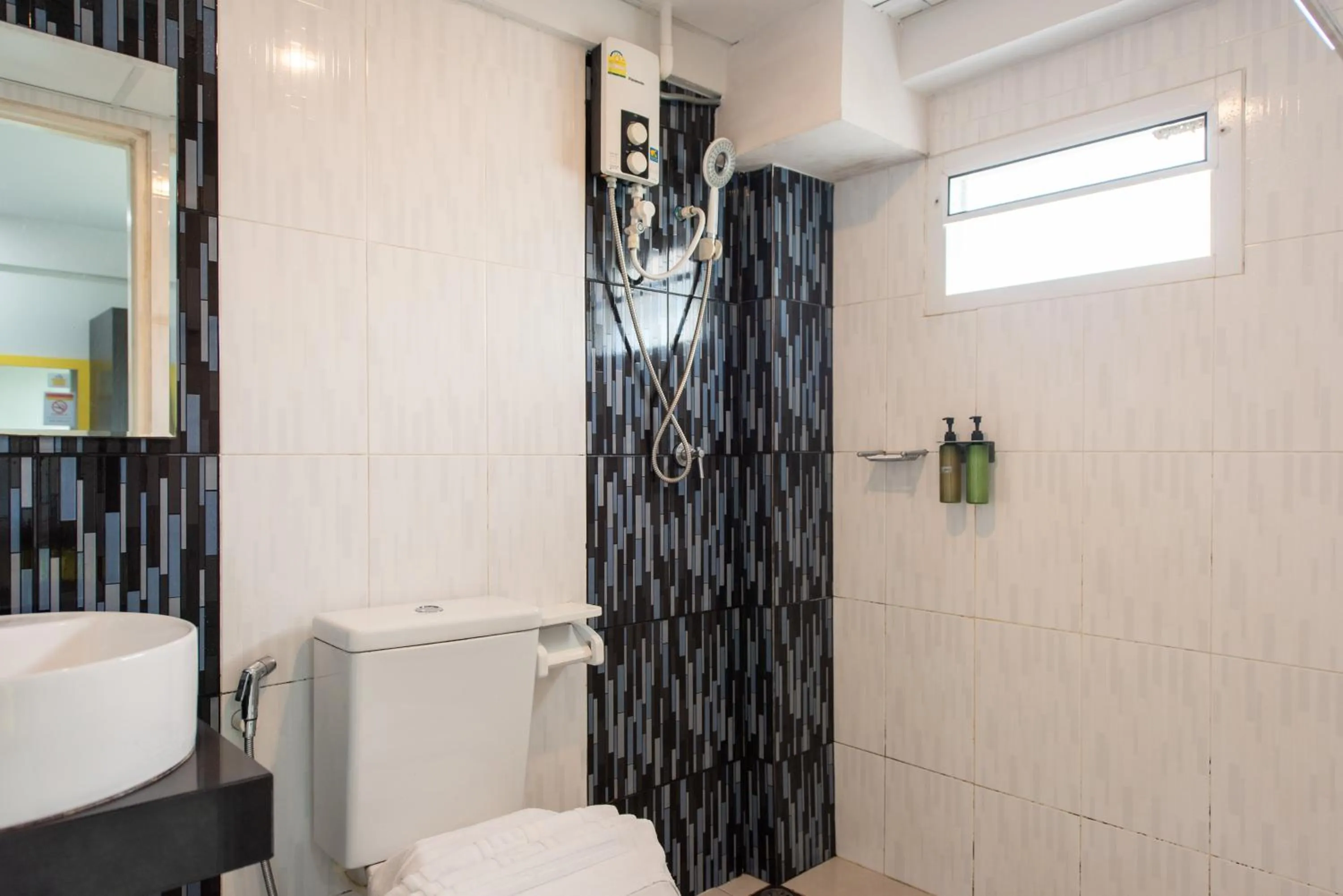 Bathroom in Riski Residence Bangbuathong