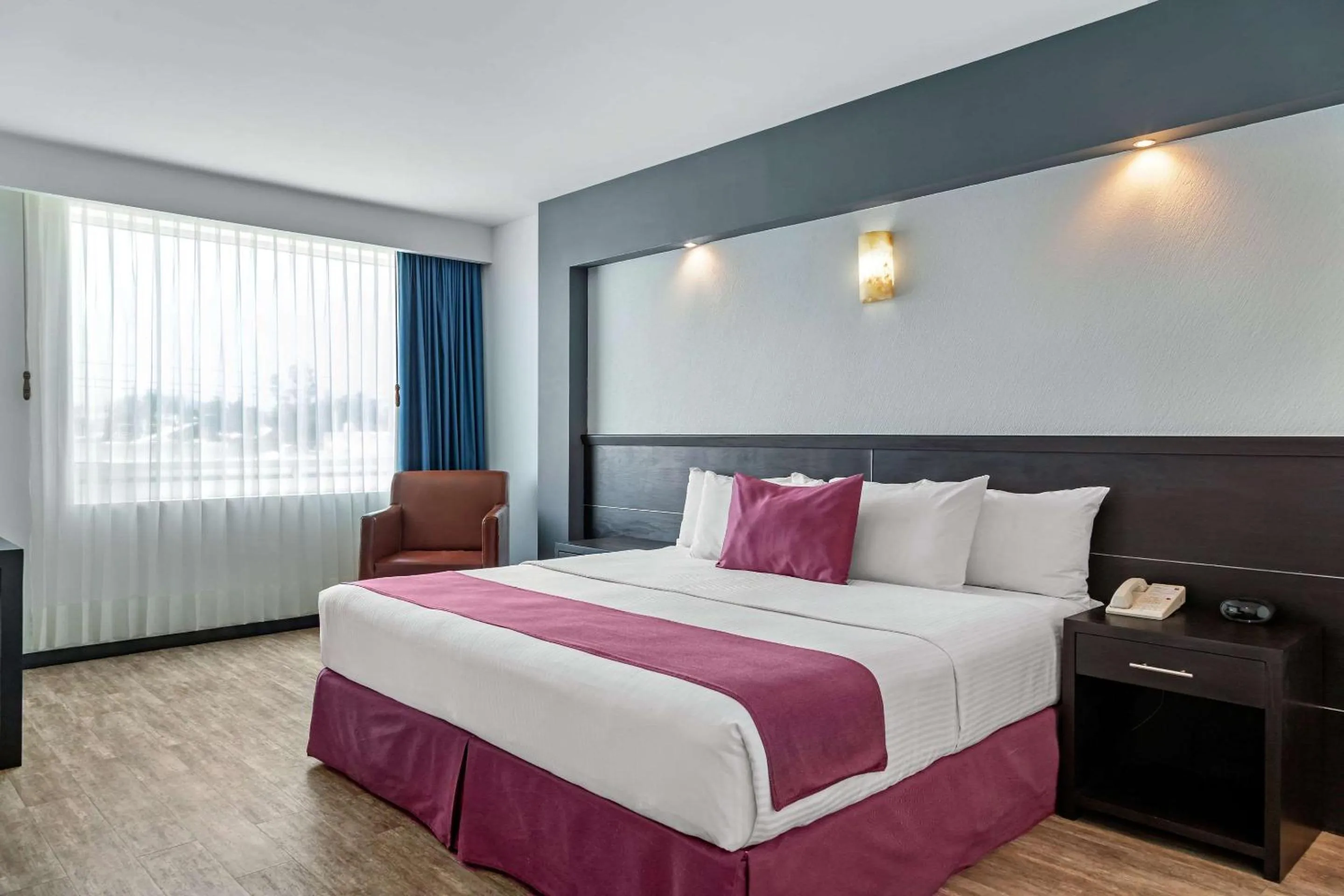 Photo of the whole room, Bed in Comfort Inn Morelia