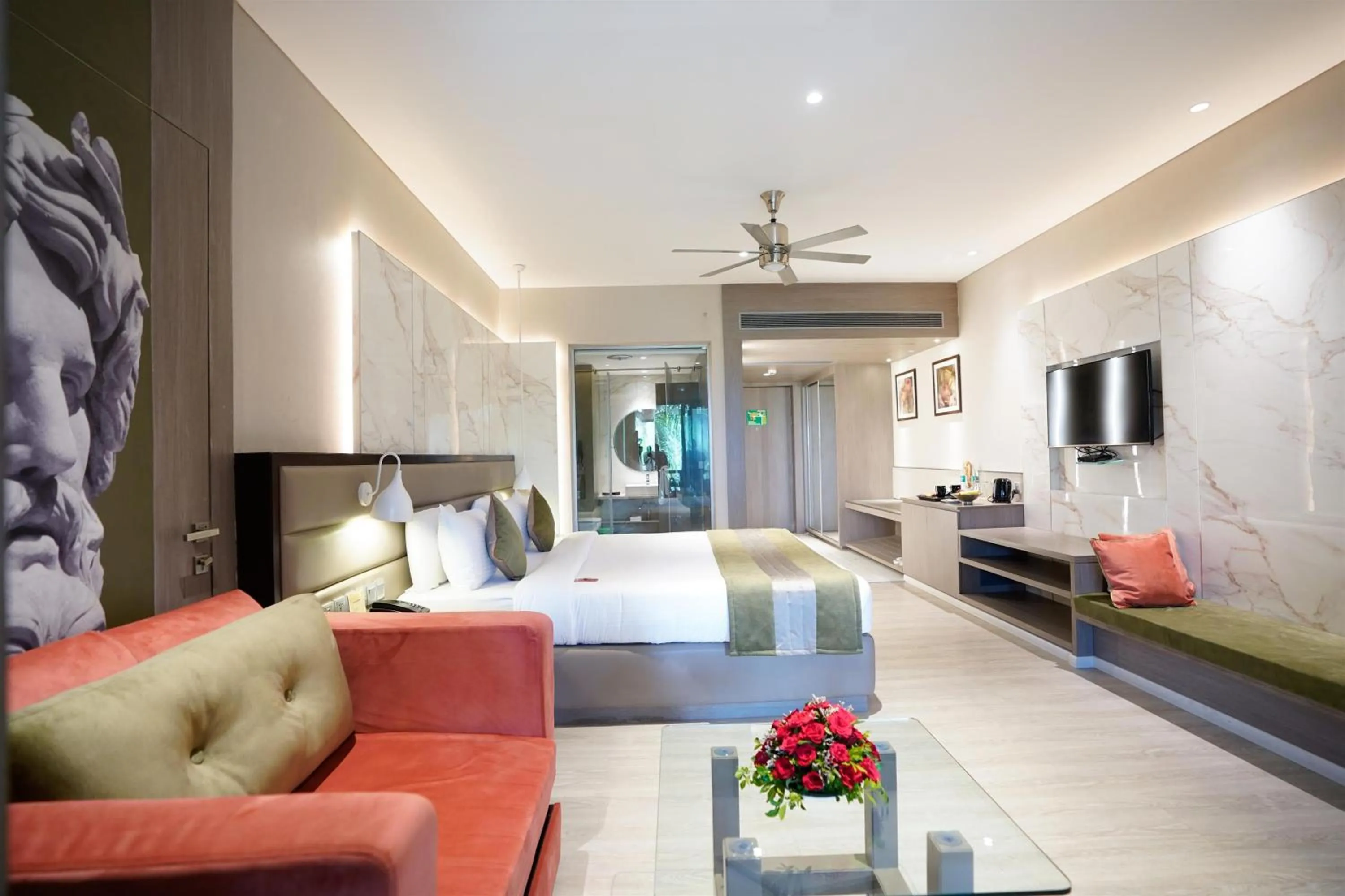 Seating area, Bed in The Corinthians Resort