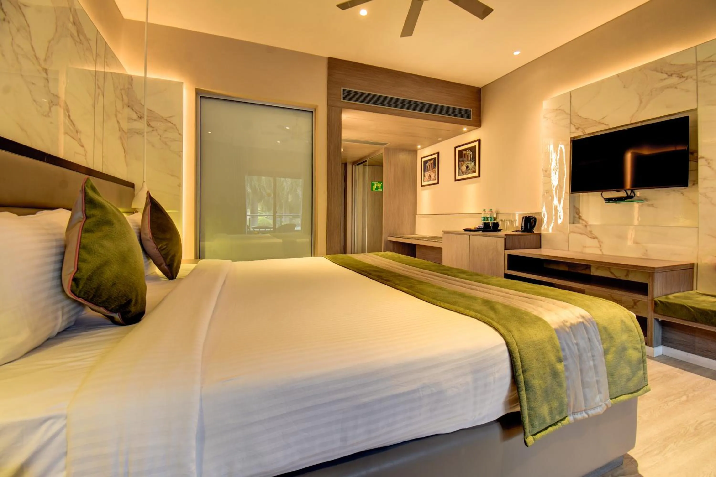 Bed in The Corinthians Resort
