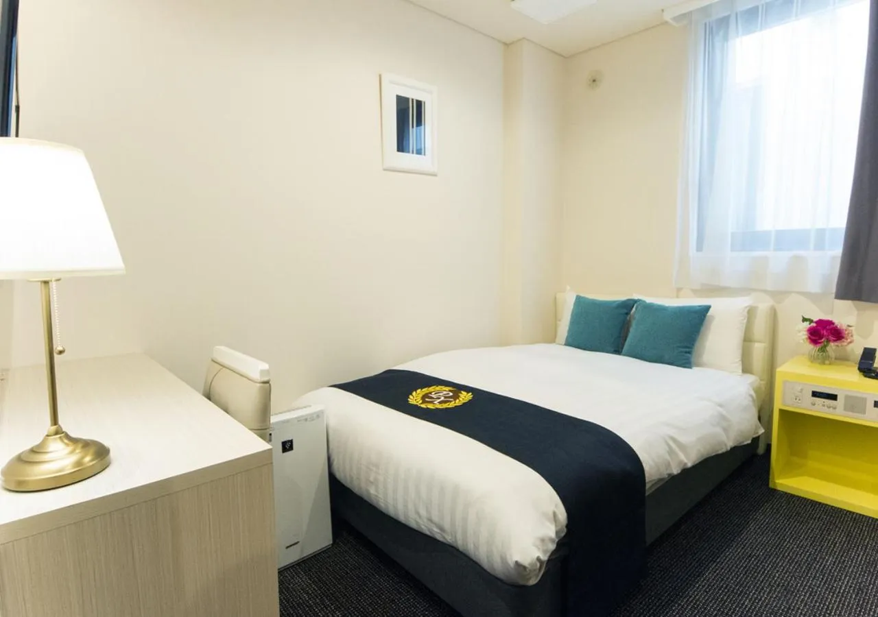 Bed in Grand Park Hotel Panex Tokyo