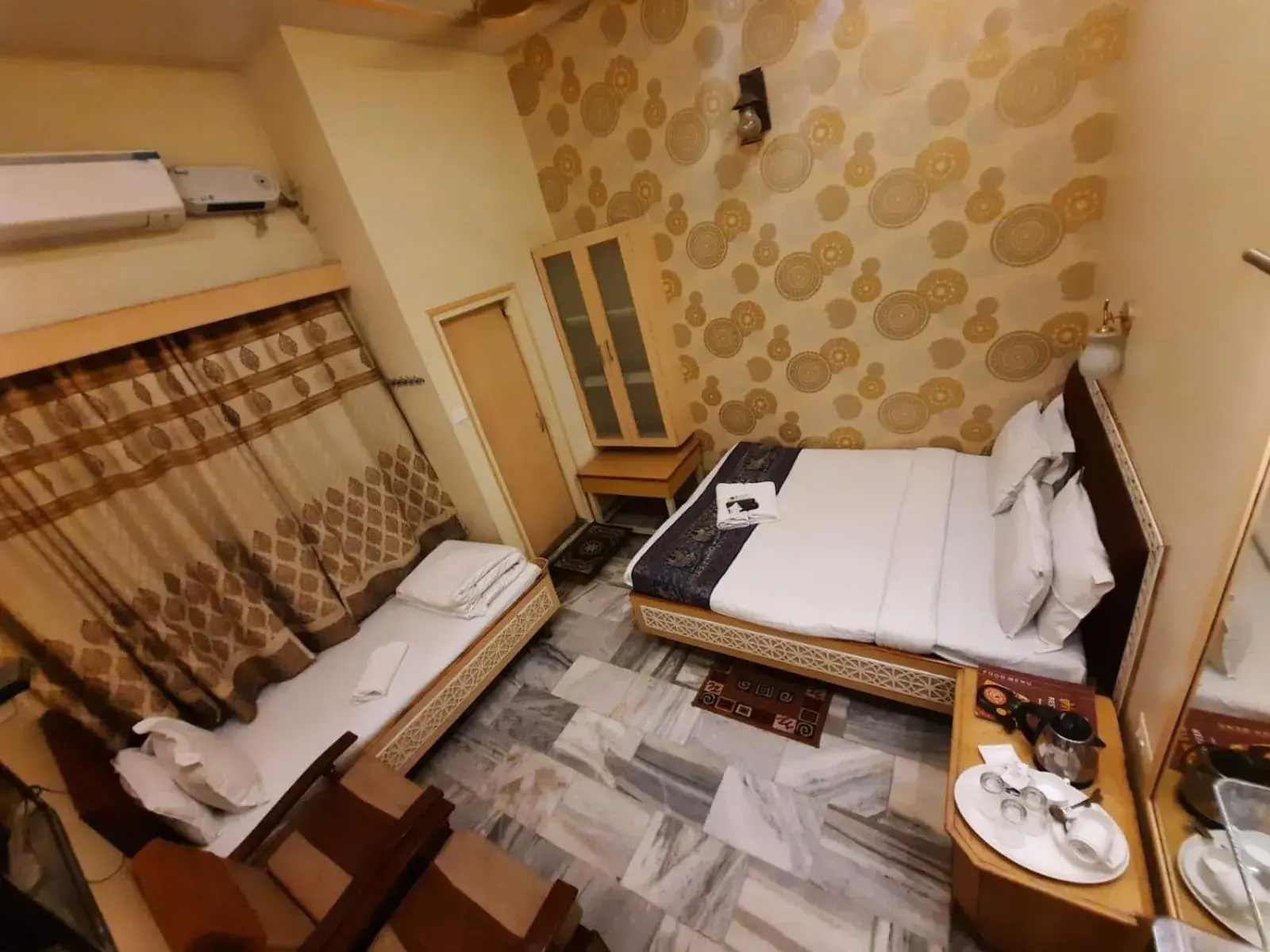 Economy Triple Bed Non View in Hotel Temple On Ganges Economy Triple Bed Non View in Hotel Temple On Ganges