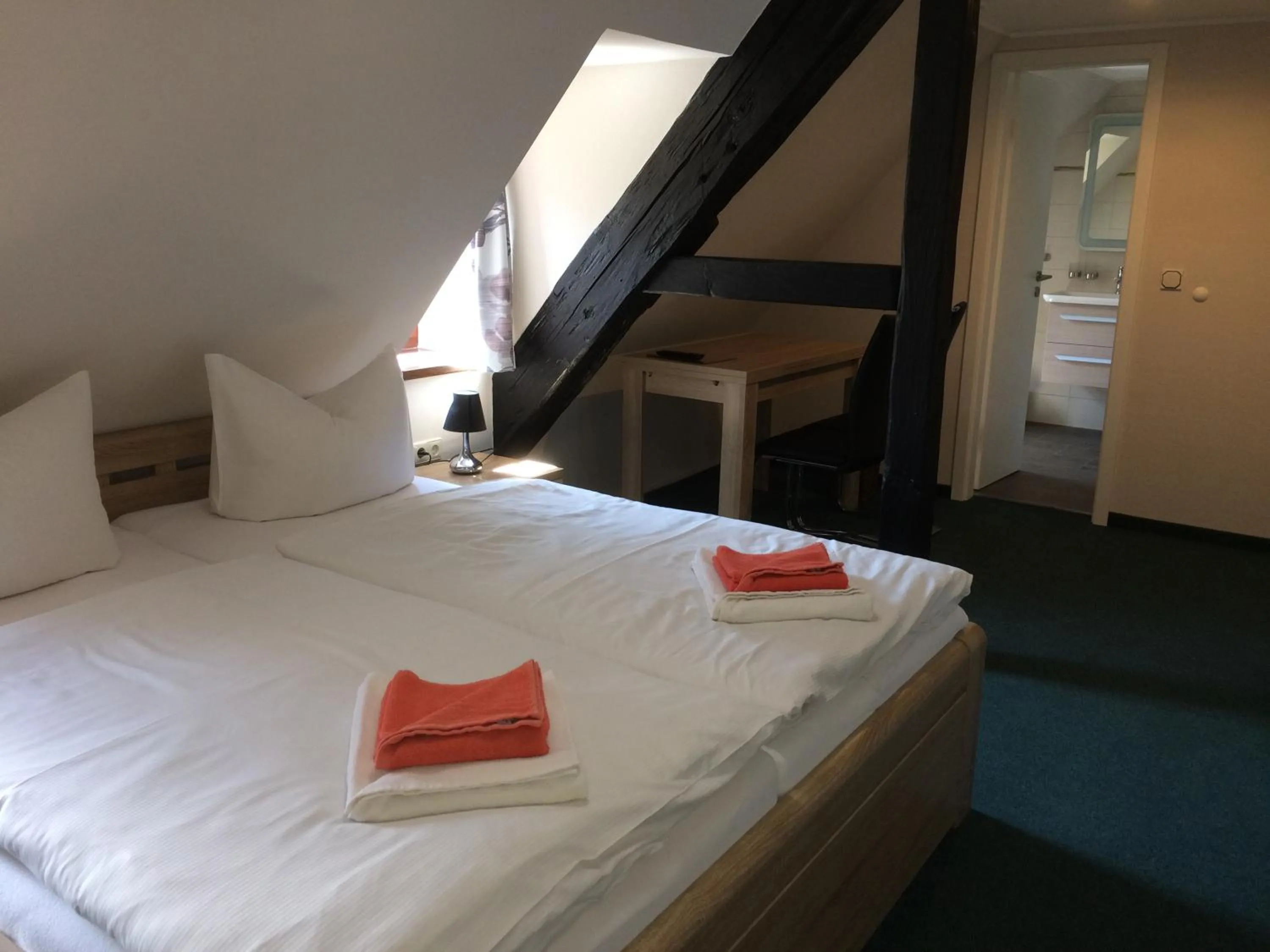 Photo of the whole room, Bed in Schlossgasthaus Lichtenwalde
