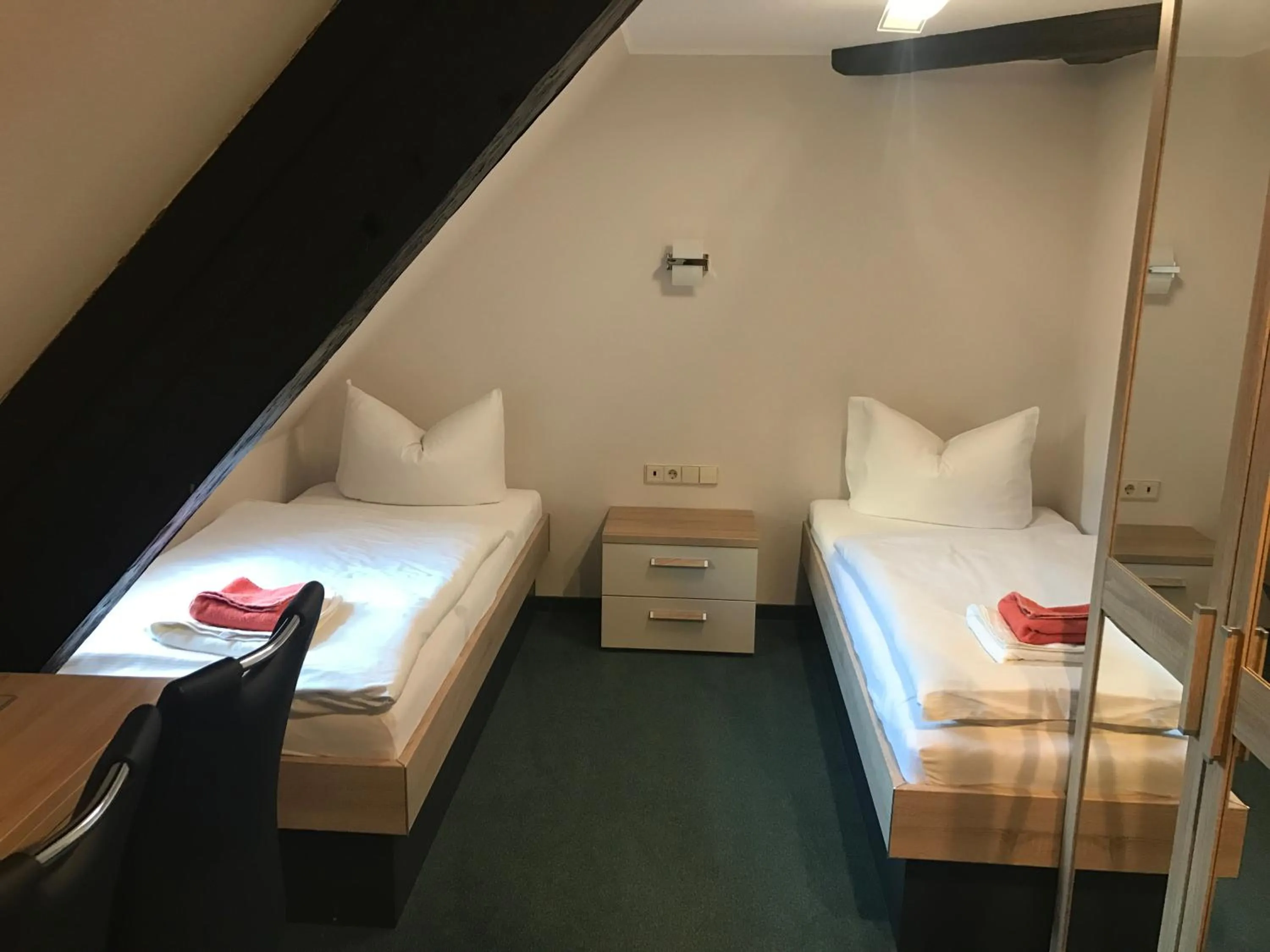 Photo of the whole room, Bed in Schlossgasthaus Lichtenwalde